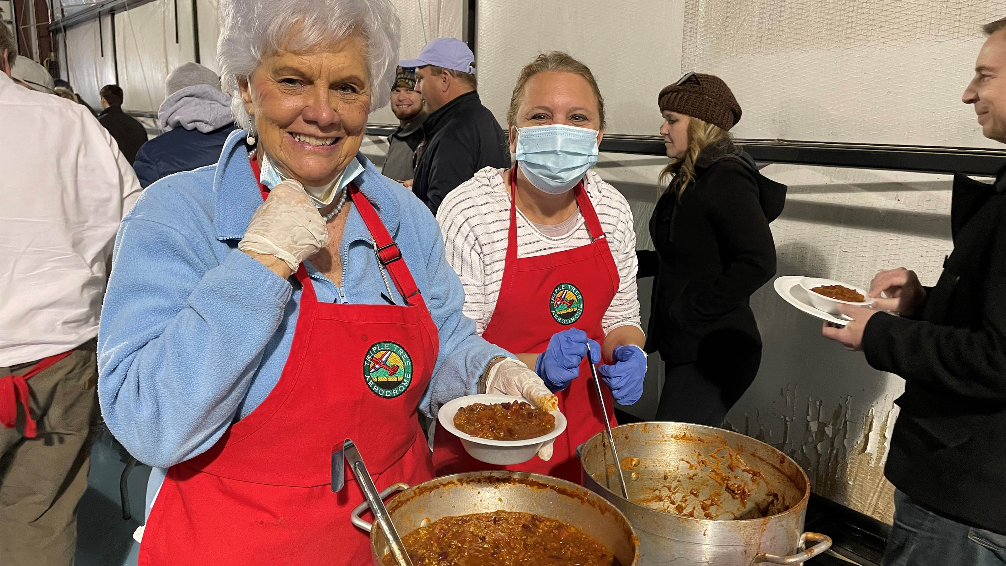 Triple Tree volunteers served chili to hundreds of enthusiastic aviators during the annual Chilly Chili Fly-In. Photo by Cayla McLeod.
