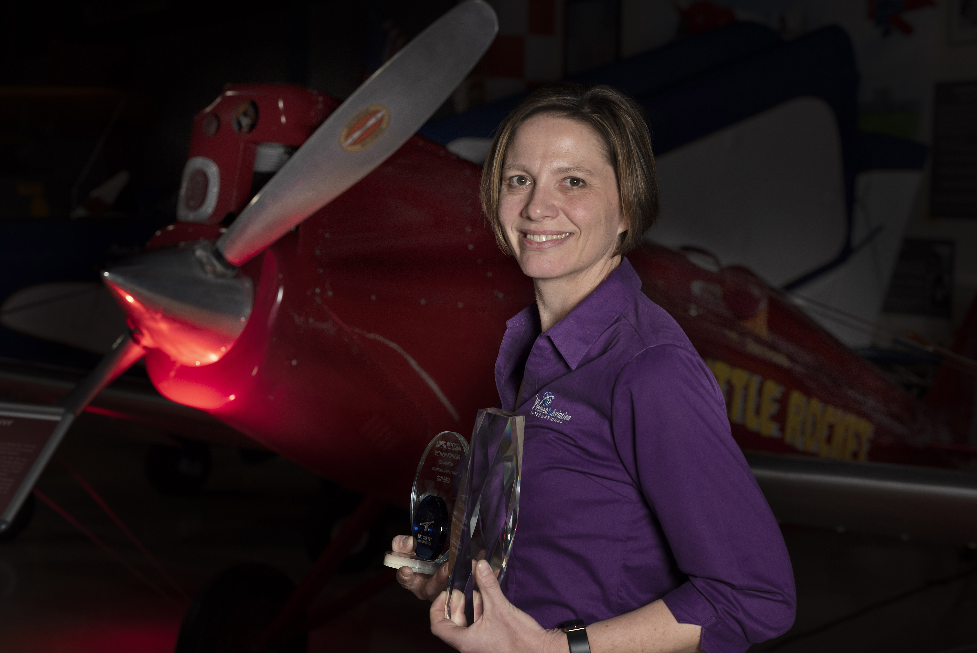 CFI Ambyr Peterson from Minneapolis is named the best CFI during the AOPA Flight Training Experience Awards at the Aerospace Center for Excellence adjacent to Lakeland Linder International Airport in Lakeland, Florida, February 9. Photo by David Tulis.