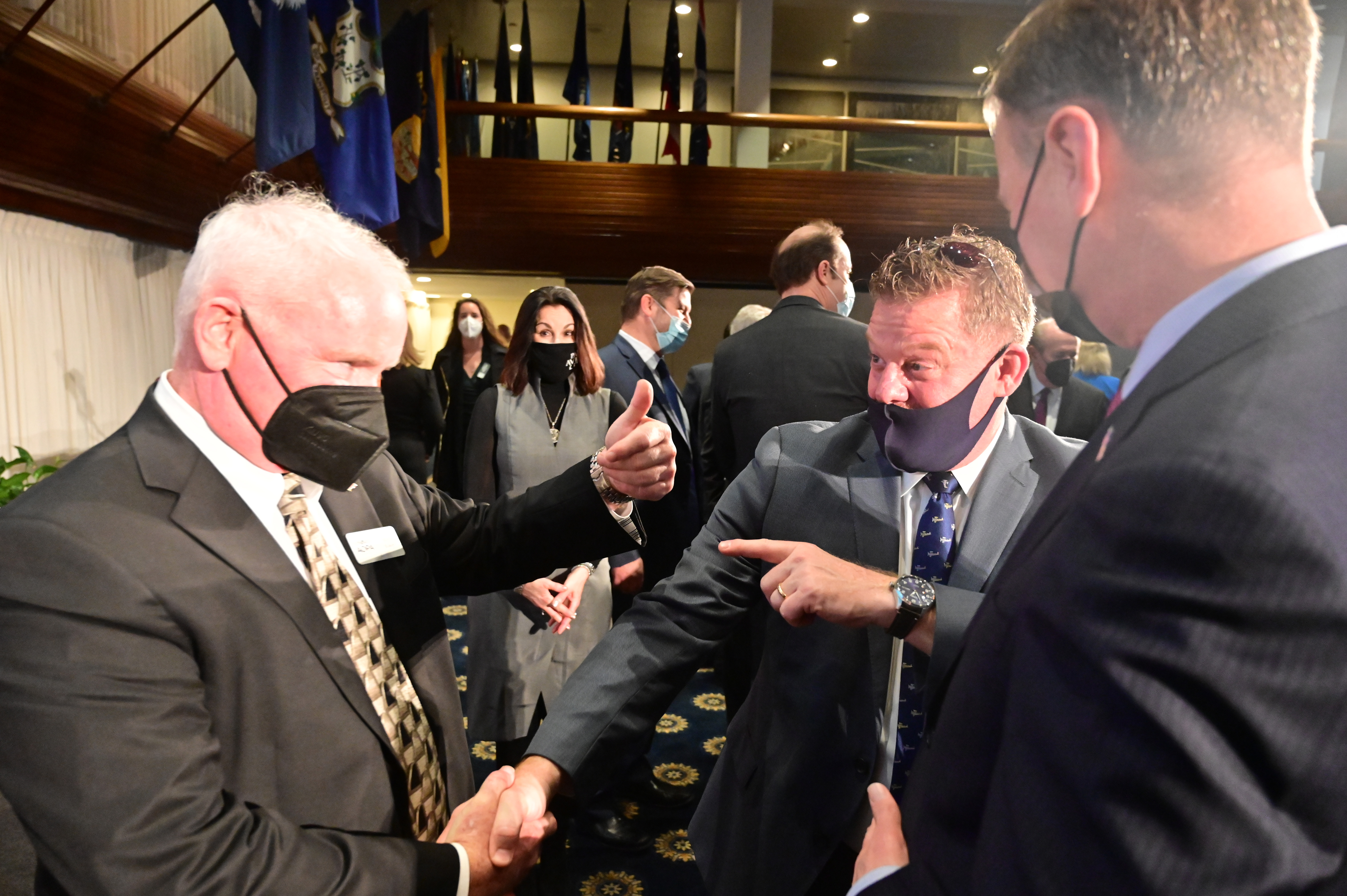 AOPA President Mark Baker shakes the hand of Cirrus Aircraft Customer Experience President Todd Simmons at the General Aviation Manufacturers Association State of the Industry event in Washington, D.C., on February 23. Cirrus had a sparkling year of sales in 2021, posting double-digit gains in both SR-series piston deliveries, as well as the SF50 Vision Jet. Photo by David Tulis.
