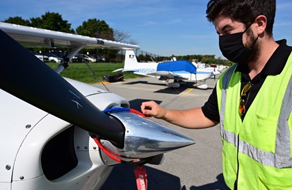 A propeller lock is secured around a Cessna 172 Skyhawk shortly after arrival at College Park Airport in the FRZ near Washington, D.C. Photo by David Tulis.