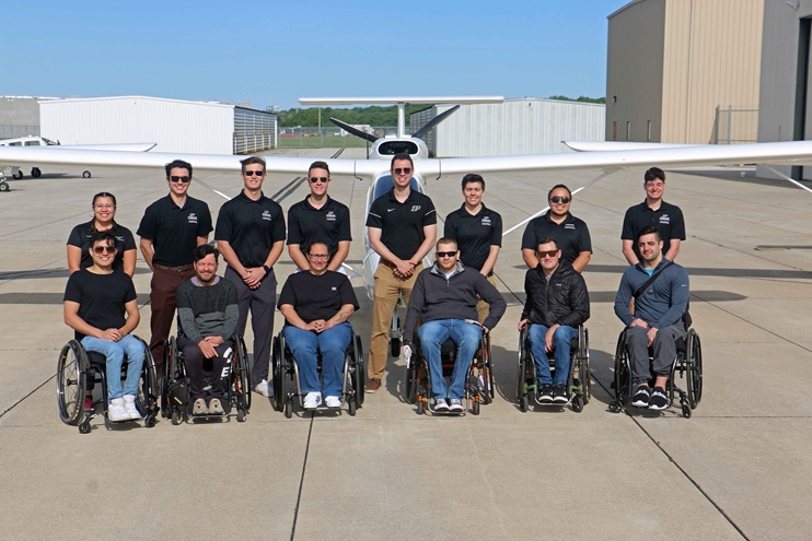 Able Flight’s class of 2022, shown here with their Purdue University flight instructors, will receive their wings during a ceremony July 26 during EAA AirVenture Oshkosh. Photo courtesy of Able Flight. 