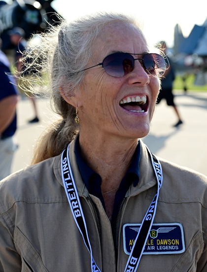 Lewis Air Legends' Averille Dawson smiles after crewing a sunrise sortie during EAA AirVenture Oshkosh in Wisconsin, July 27. Photo by David Tulis.