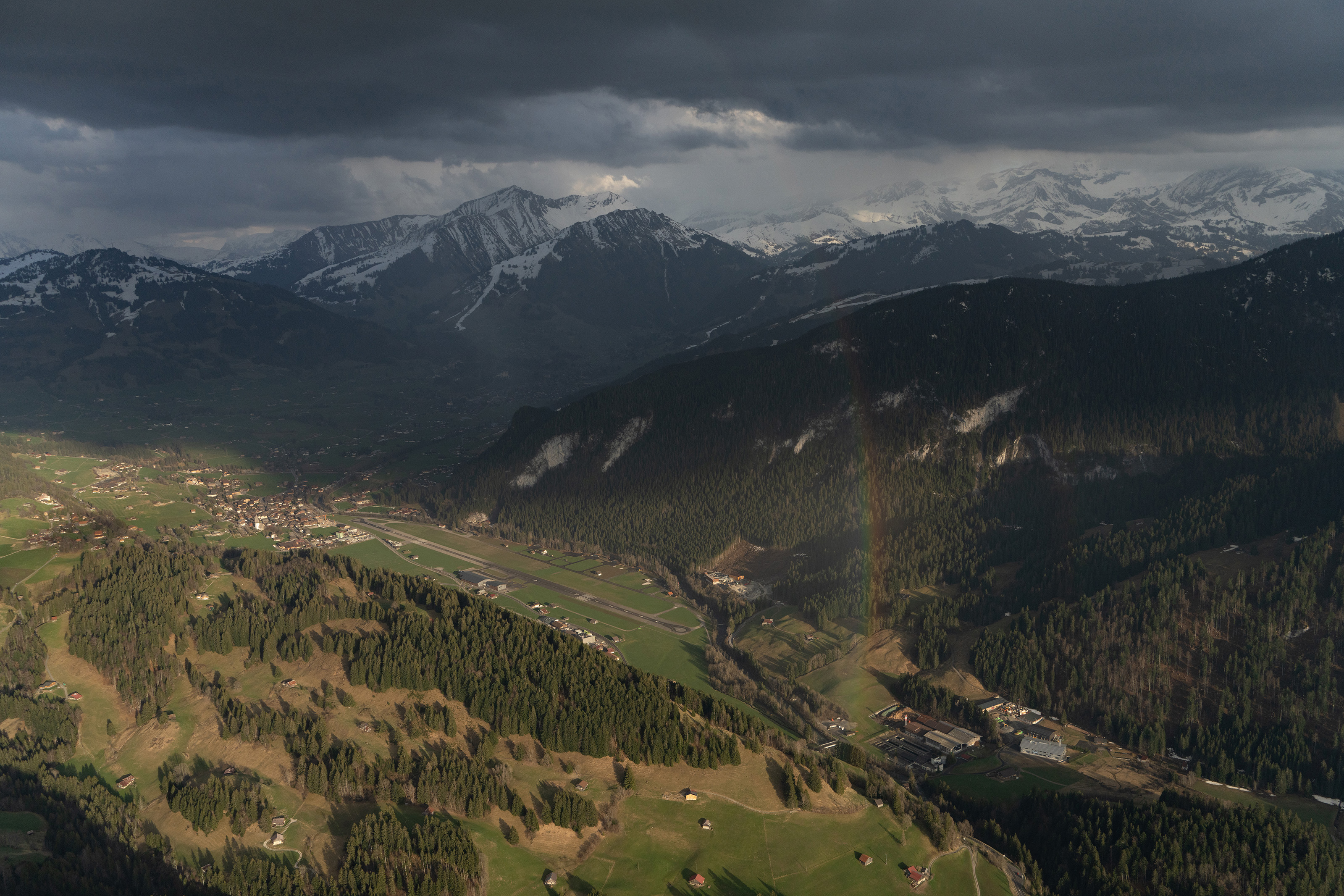 Waiting for rain to clear west of the field. Photo by Garrett Fisher.