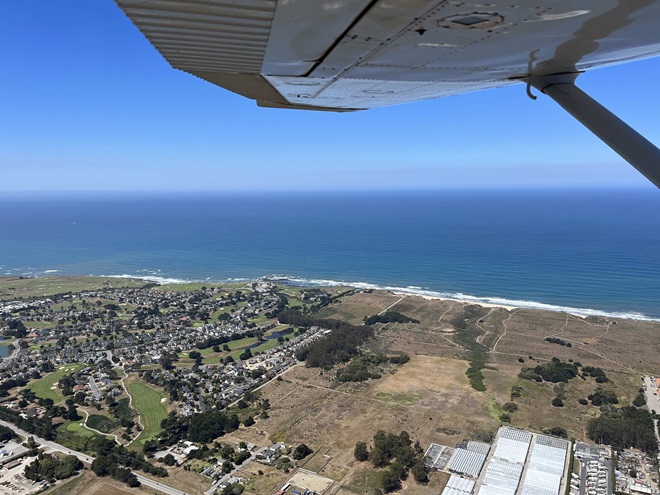 Flying over the Half Moon Bay Golf Links into Half Moon Bay, California. Photo courtesy of Niki Britton.