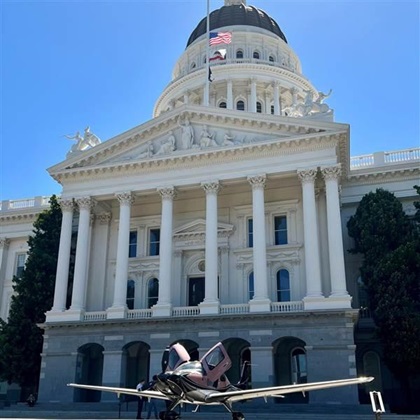 The Cirrus SR22 parked on the California state Capitol steps drew a crowd, including legislators, school field trip groups, and the public. Photo courtesy of the Association of California Airports. 