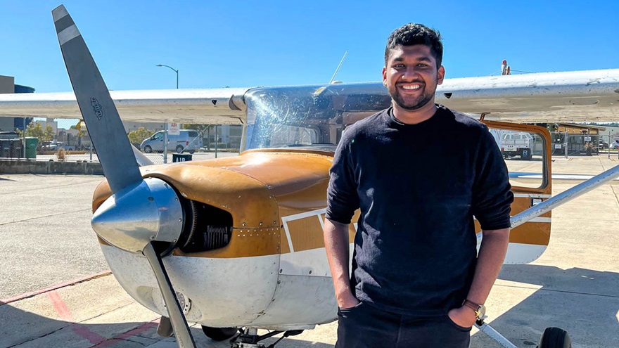 Student pilot Akash Aggarwal stands in front of the Cessna 152 he was flying when he lost throttle control on final approach at Watsonville Municipal Airport in California. Photo by Niki Britton.