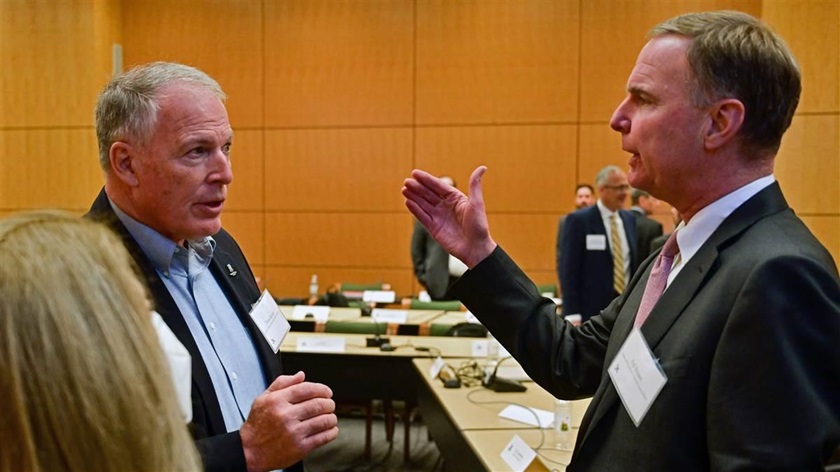 General Aviation Manufacturers Association President Pete Bunce (left) talks with National Business Aviation Association President Ed Bolen as they join stakeholders including AOPA, the FAA, and others during an Eliminate Aviation Gasoline Lead Emissions (EAGLE) meeting in Washington, D.C., March 16.  Photo by David Tulis.