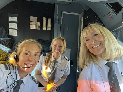 Capt. Kiki Culler (right) with Sylvie Benjamin (left) and Sarah Hunter (back) in an Airbus A330 at the Kahului Airport in Maui, Hawaii. Photo courtesy of Kiki Culler.