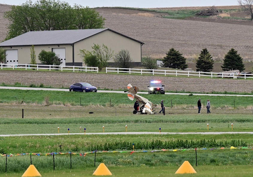Eyewitnesses were shocked and speechless following the May 20 crash. All activity on the airfield stopped, other than the rescue effort. Photo by David Tulis.