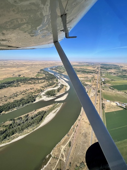 The Yellowstone River, as seen departing Runway 13 from Frank Wiley Field in Miles City, Montana. Photo by Erick Webb.