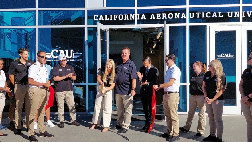 California Aeronautical University President Matthew Johnston stands with students and staff at the ribbon-cutting ceremony for CAU’s new San Diego location. Photo courtesy of CAU.