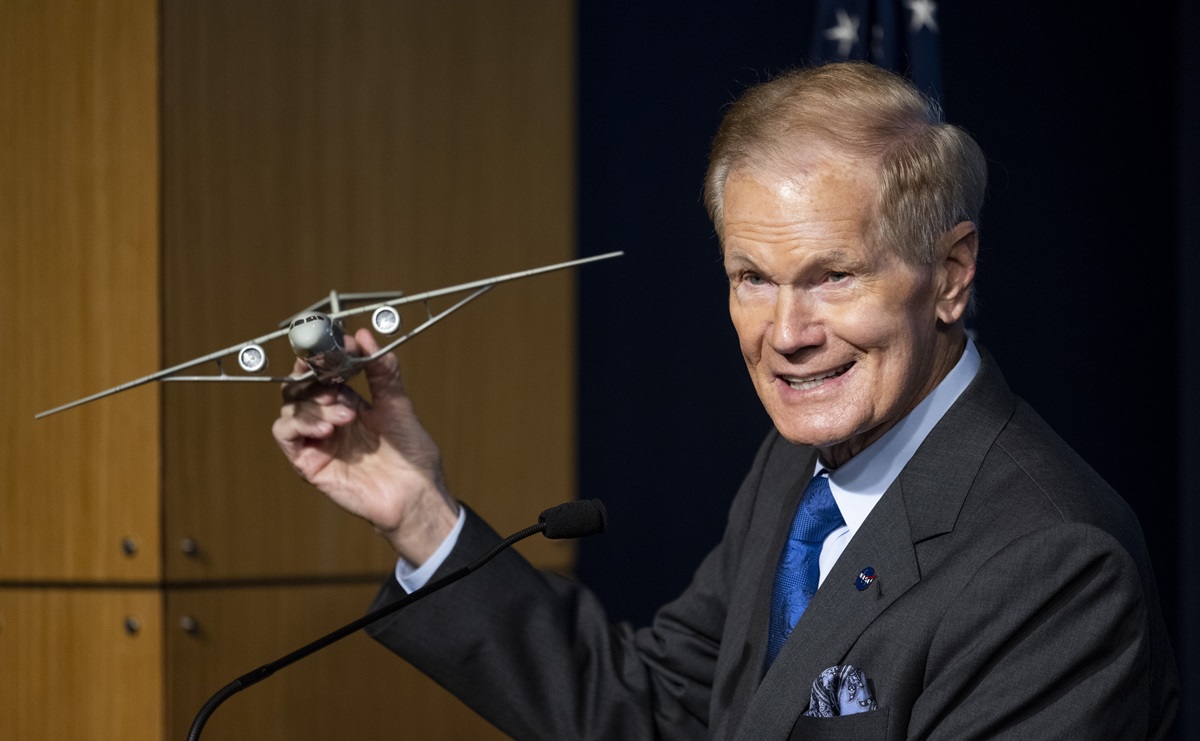 NASA Administrator Bill Nelson holds a model of an aircraft with a Transonic Truss-Braced Wing during a news conference on NASA's Sustainable Flight Demonstrator project on January 18 at the Mary W. Jackson NASA Headquarters building in Washington, D.C. Photo courtesy of NASA/Joel Kowsky.
