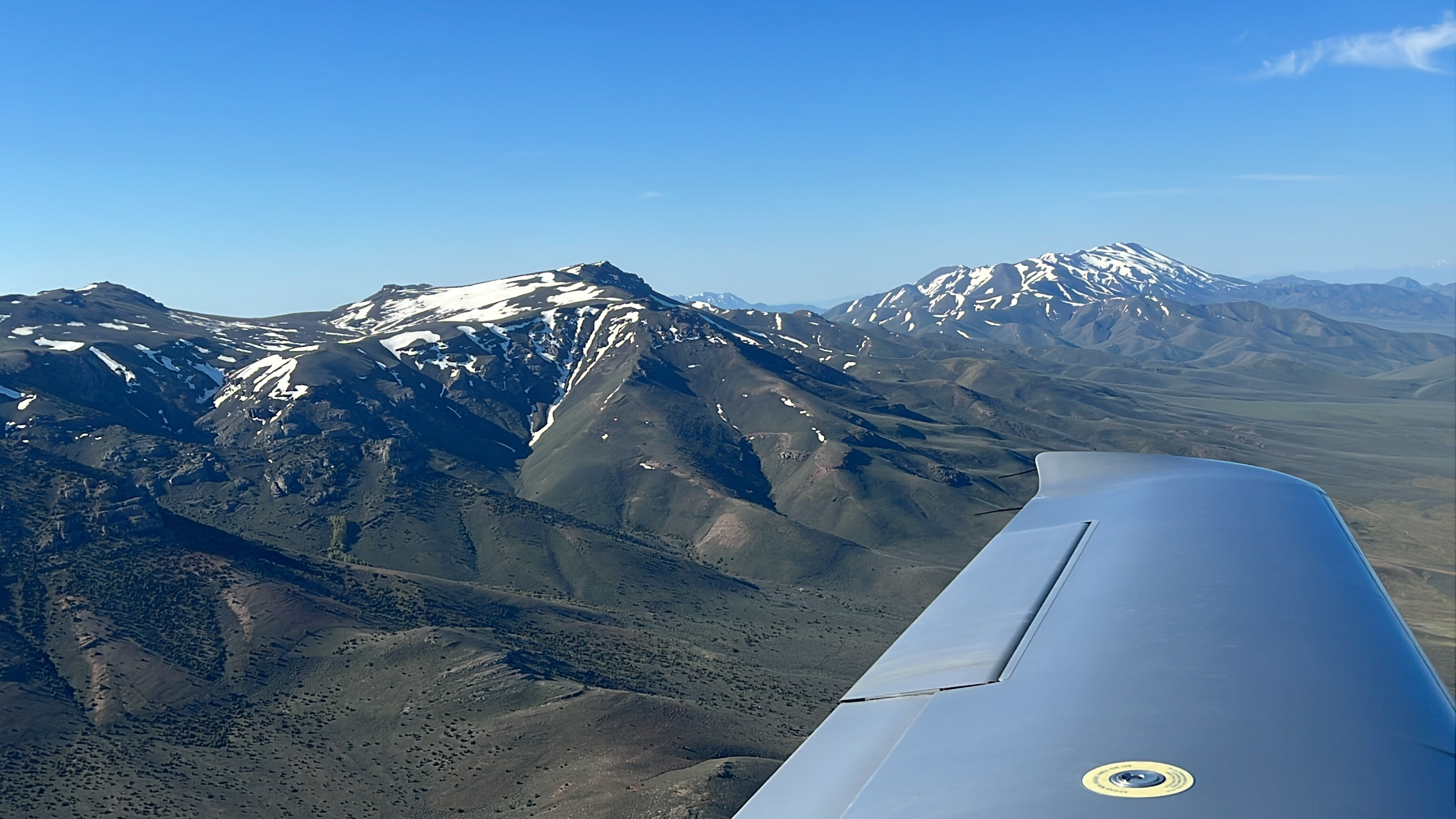 Snow clings to Nevada mountains. Photo courtesy of Bob Reynolds.