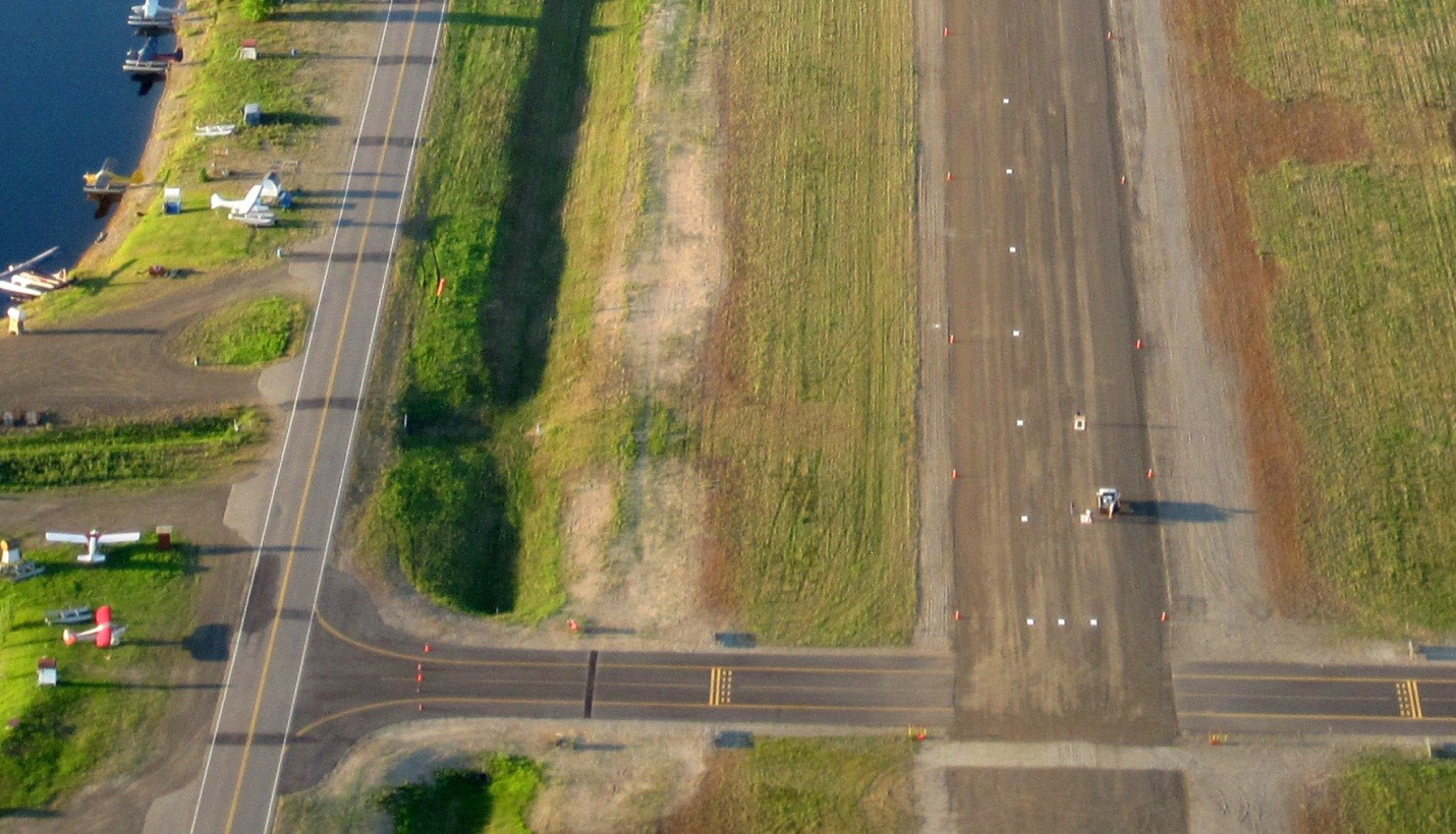 An aerial view of painting the short-field practice runway on the ski strip at Fairbanks International Airport. Photo courtesy of the Fairbanks General Aviation Association.