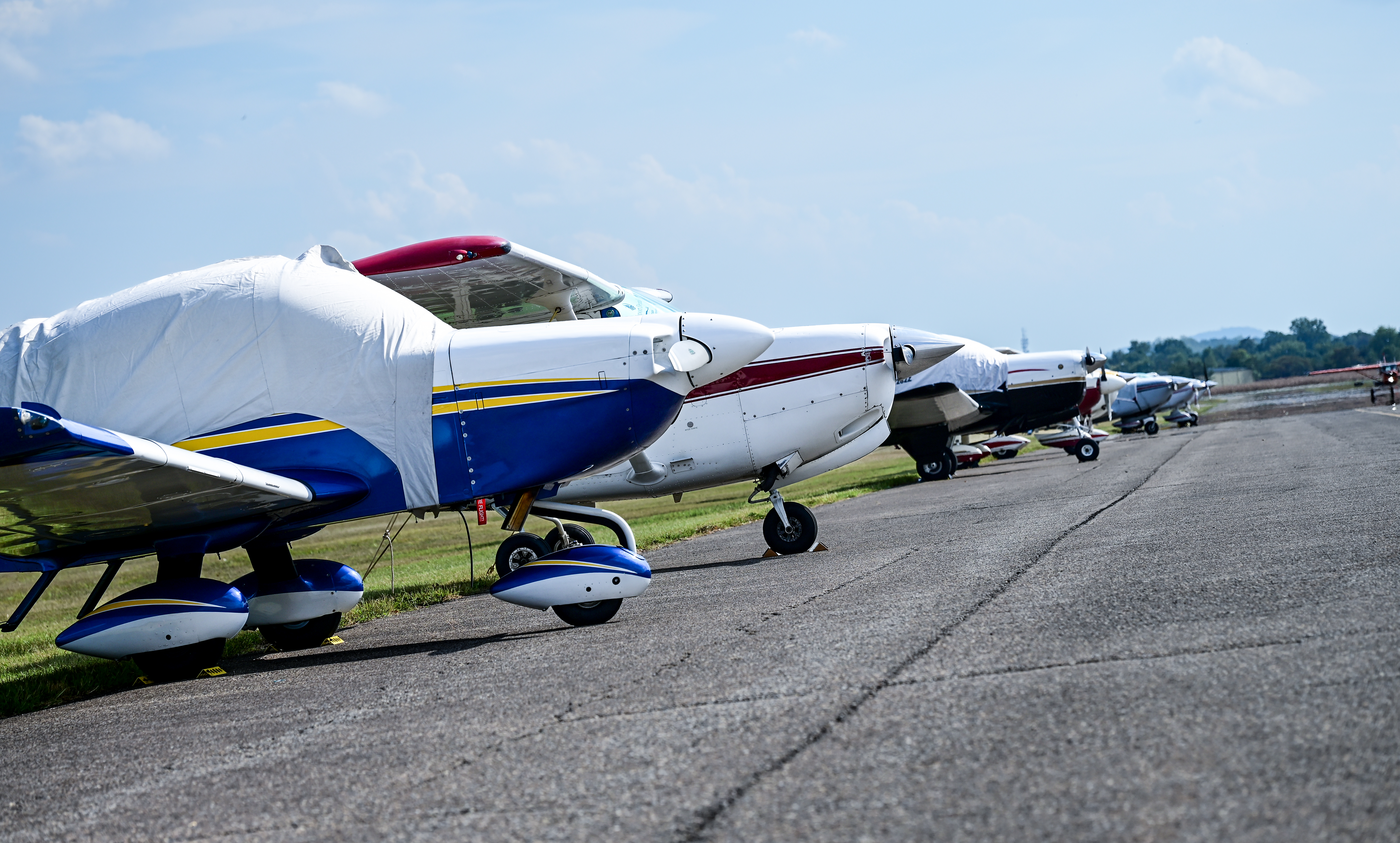 More than a dozen transient aircraft are parked for the Aviator Showcase. Photo by David Tulis. 