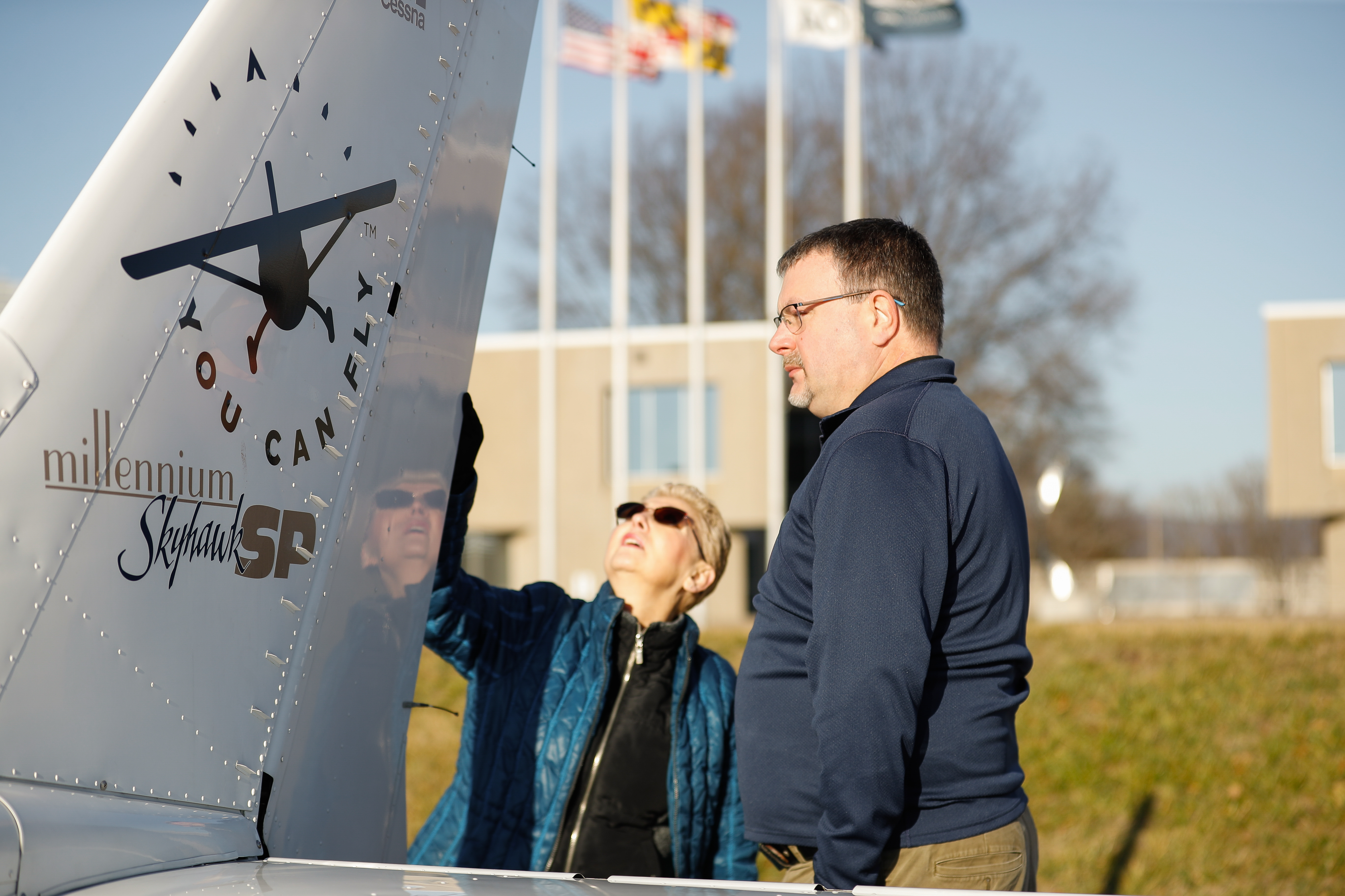 High school educator Jason McMullen and CFI Luz Beattie preflight the airplane before a discovery flight. Photo by Rebecca Boone.