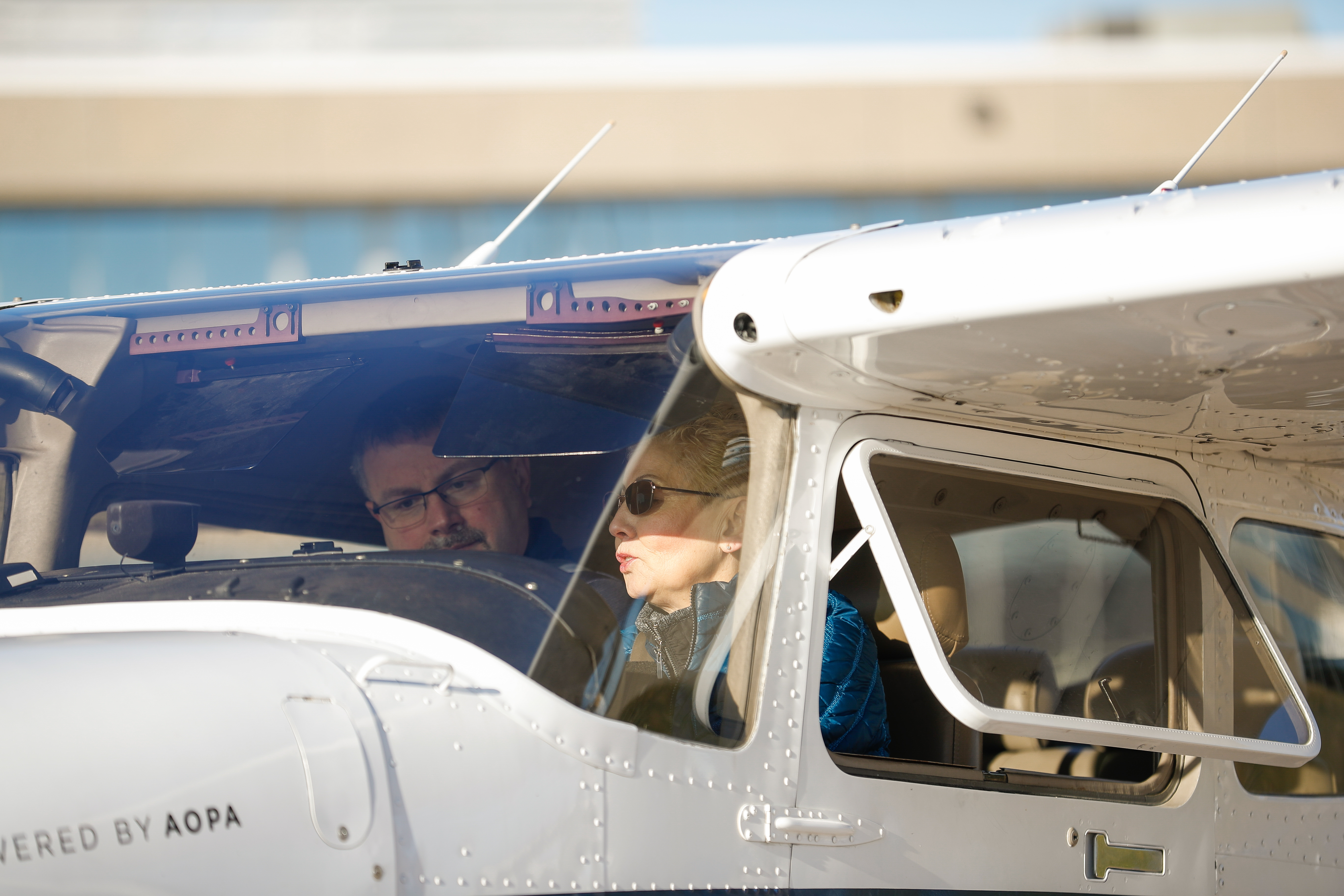 High school educator Jason McMullen participates in a discovery flight with CFI Luz Beattie. Photo by Rebecca Boone.