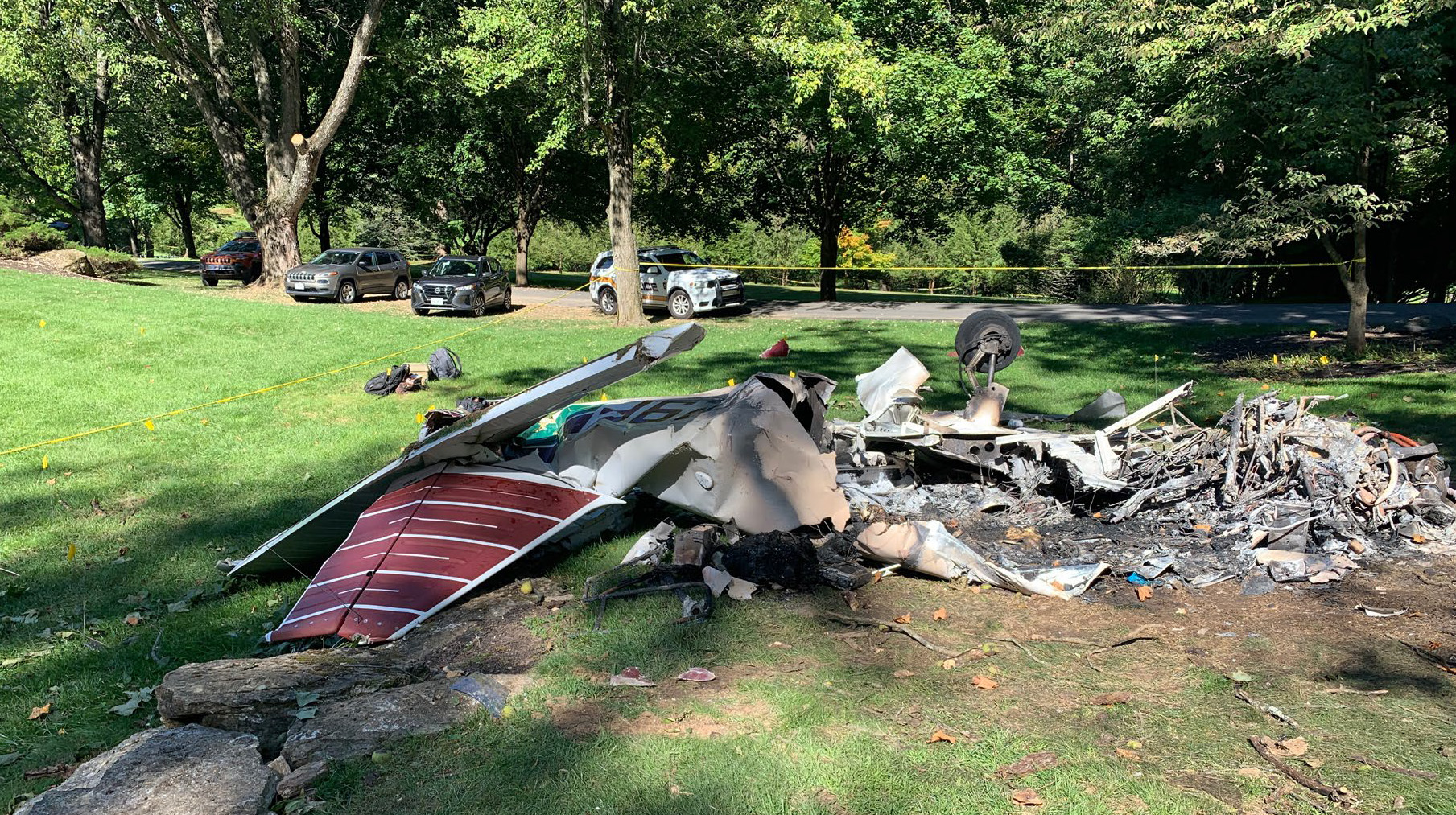 The Piper Cherokee that crashed September 28, 2022, in Pennsylvania was largely destroyed in a postcrash fire. The NTSB report notes that bystanders were able to extricate Philip McPherson from the aircraft, but the growing fire prevented rescue of Keith Kozel, 49, whose death prompted an involuntary manslaughter charge against McPherson. NTSB photo.