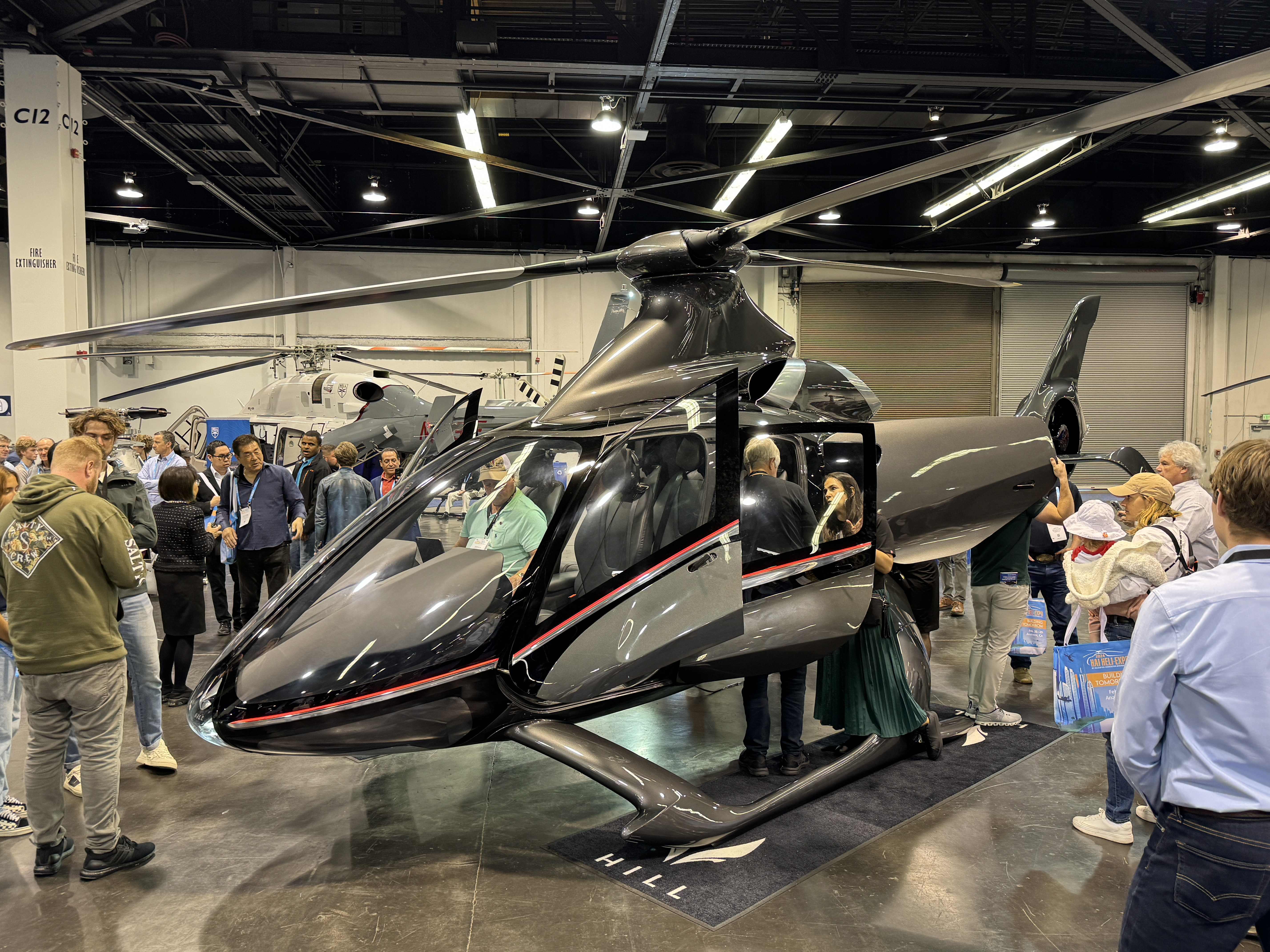 Hill Helicopters’ turbine-powered HX50 commanded an all-day audience eager to learn more about this composite newcomer at HAI Heli-Expo 2024. Photo by Niki Britton.