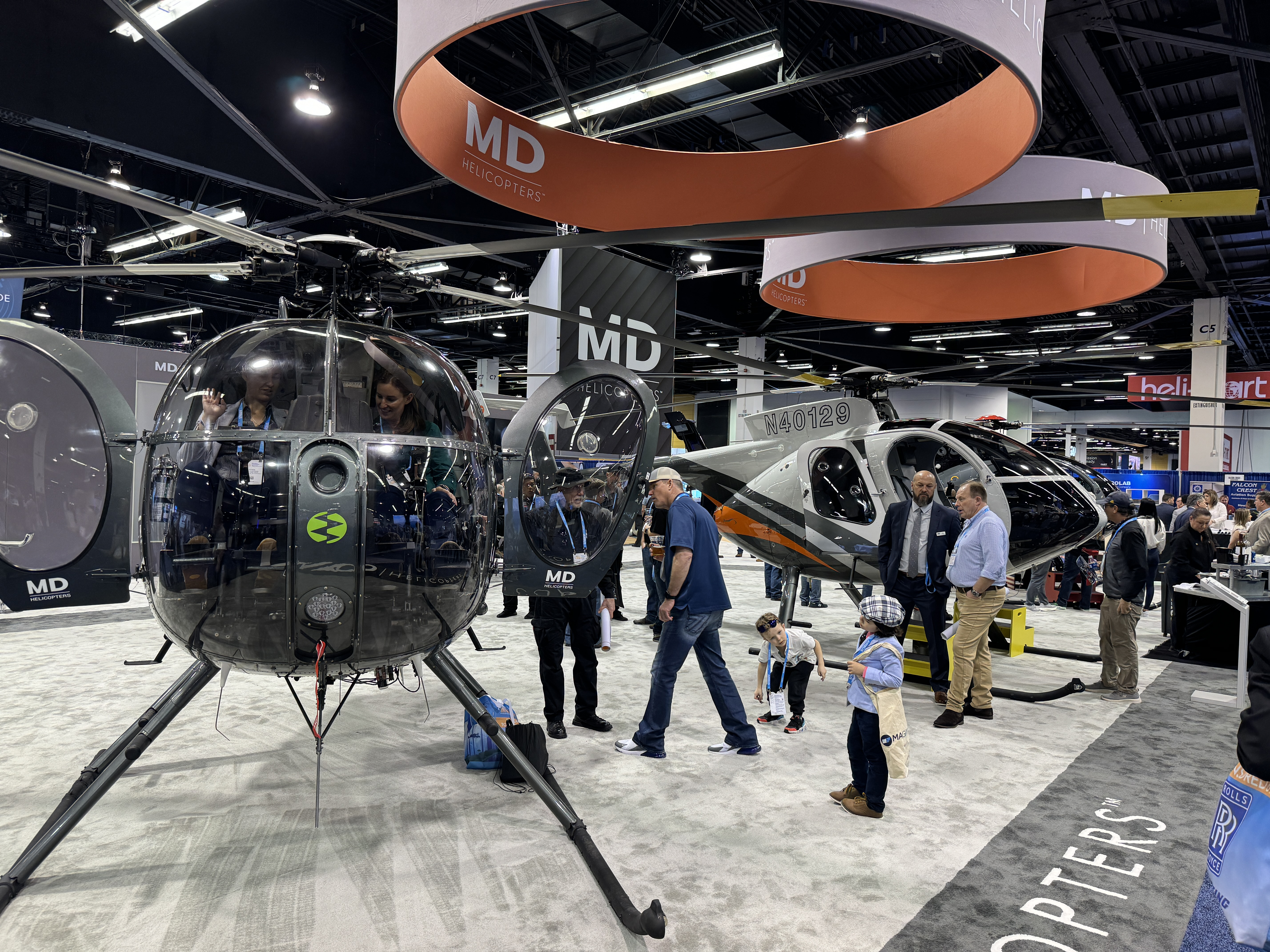Helicopter enthusiasts young and old take a look at the MD Helicopters display at HAI Heli-Expo 2024. Photo by Niki Britton.