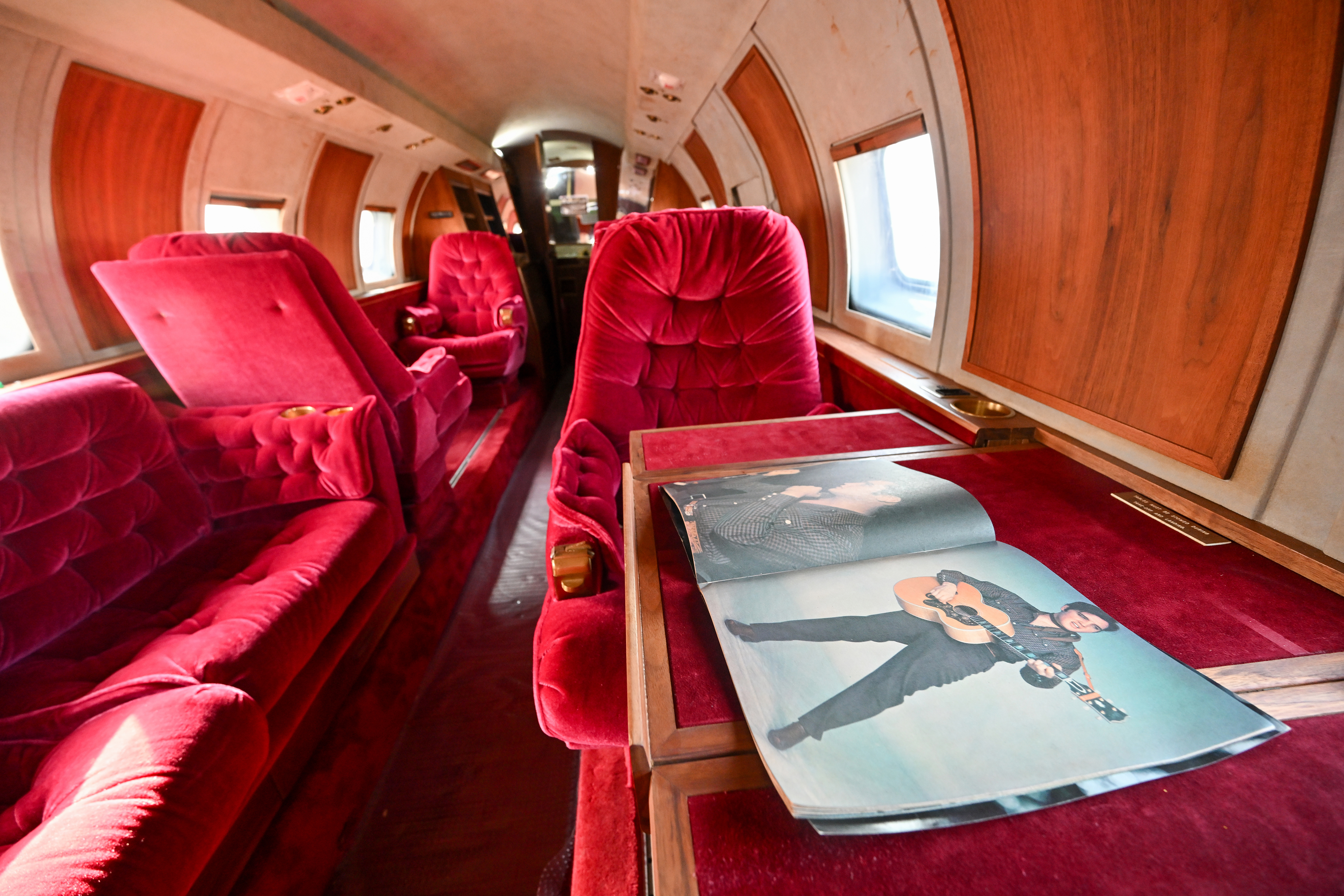 The Jimmy’s World 'Elvismobile' features the original plush red upholstery and wood paneling that emerged from decades in the desert in remarkably good condition. Photo by David Tulis.