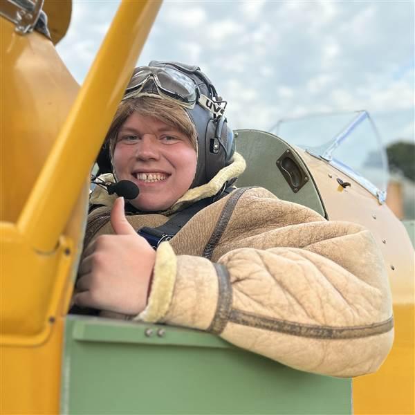 The author in the front seat of the de Havilland Tiger Moth. Photo by Madelyn Willis.