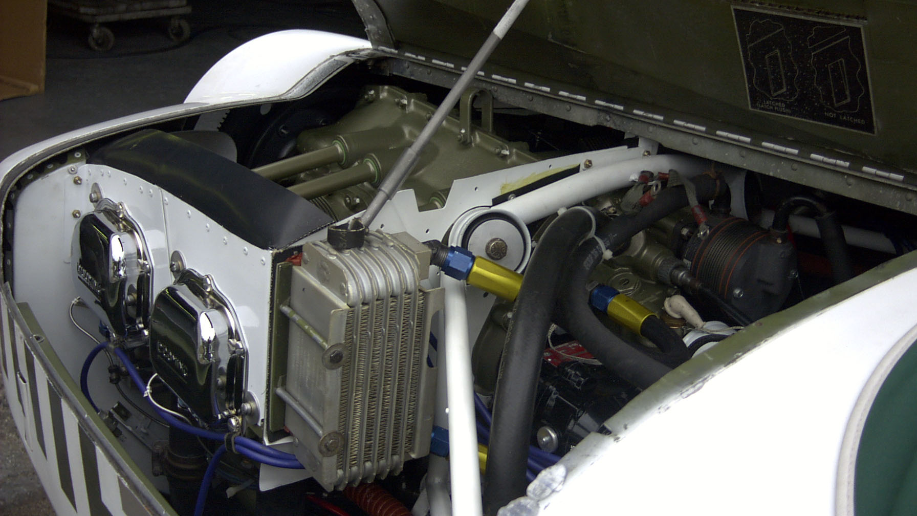 The oil cooler (installed here just aft of the engine) dissipates excess heat during engine operation. Photo courtesy of Jeff Simon.
