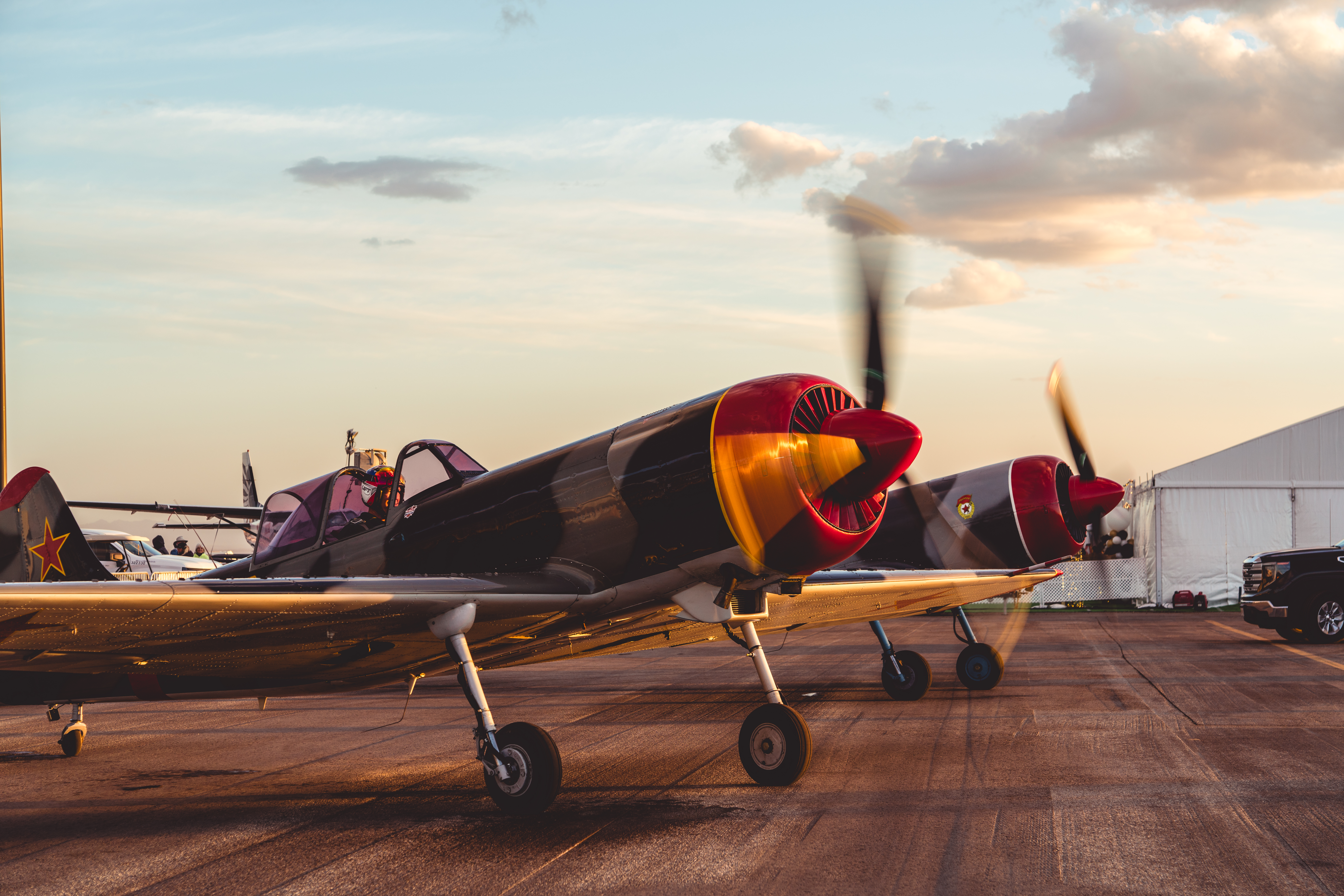 Red Thunder Airshows’ Yak 50s warm up for their performance. Photo by Jake Teague.