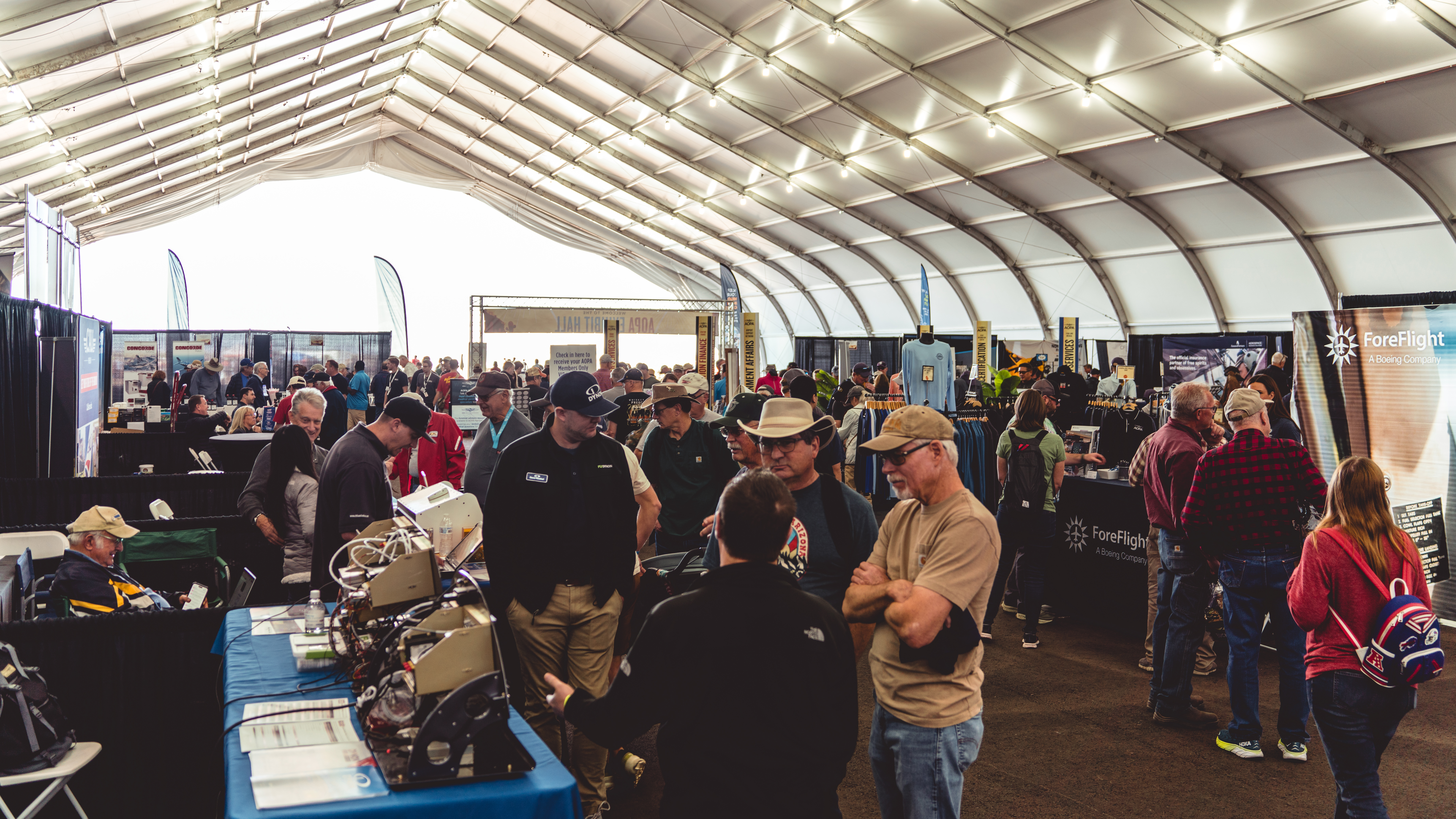 Attendees scrutinize new technology at the exhibit hall. Photo by Jake Teague.