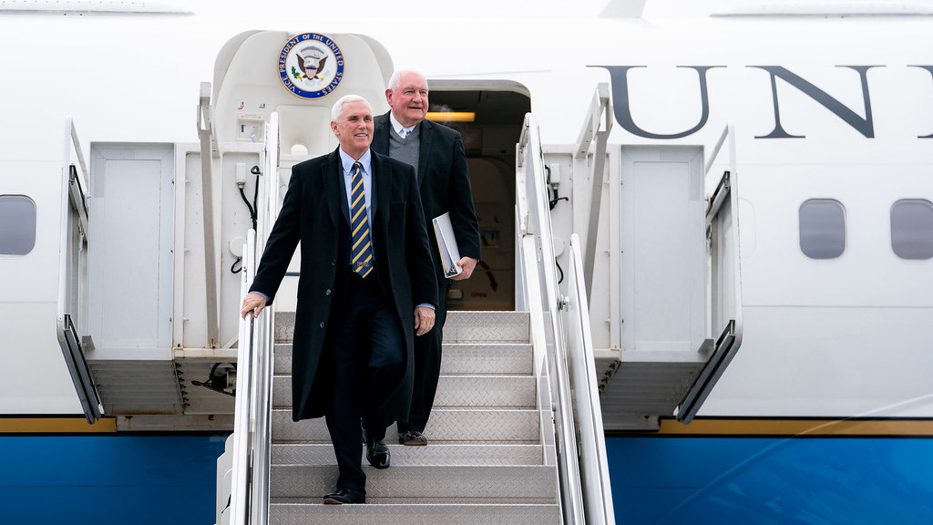 Perdue disembarks Air Force Two with then-Vice President Mike Pence while serving as secretary of agriculture. Photo courtesy of Sonny Perdue.