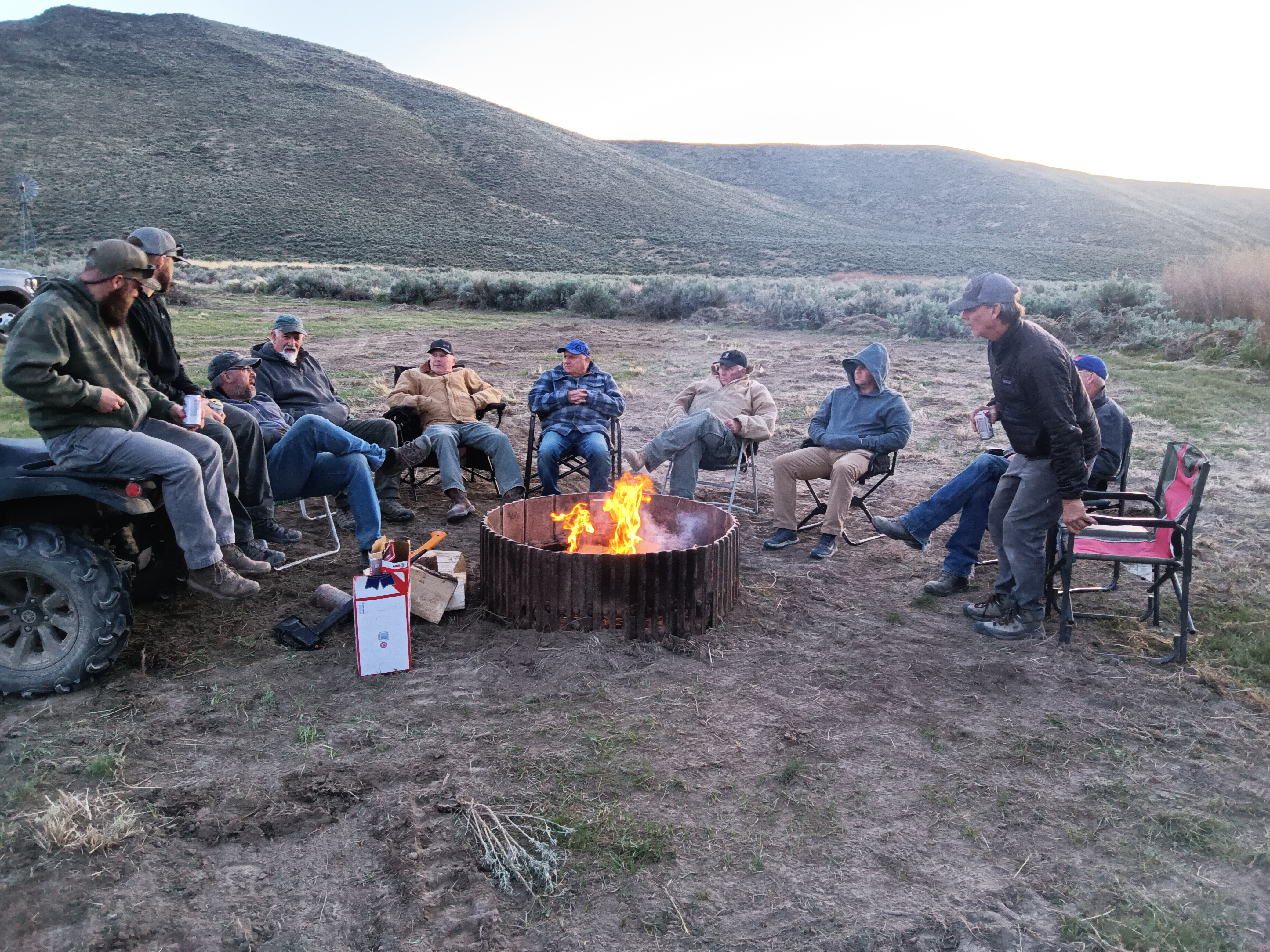 Volunteers organized by the Idaho Aviation Association gather around the fire. Photo courtesy of JRBAF.