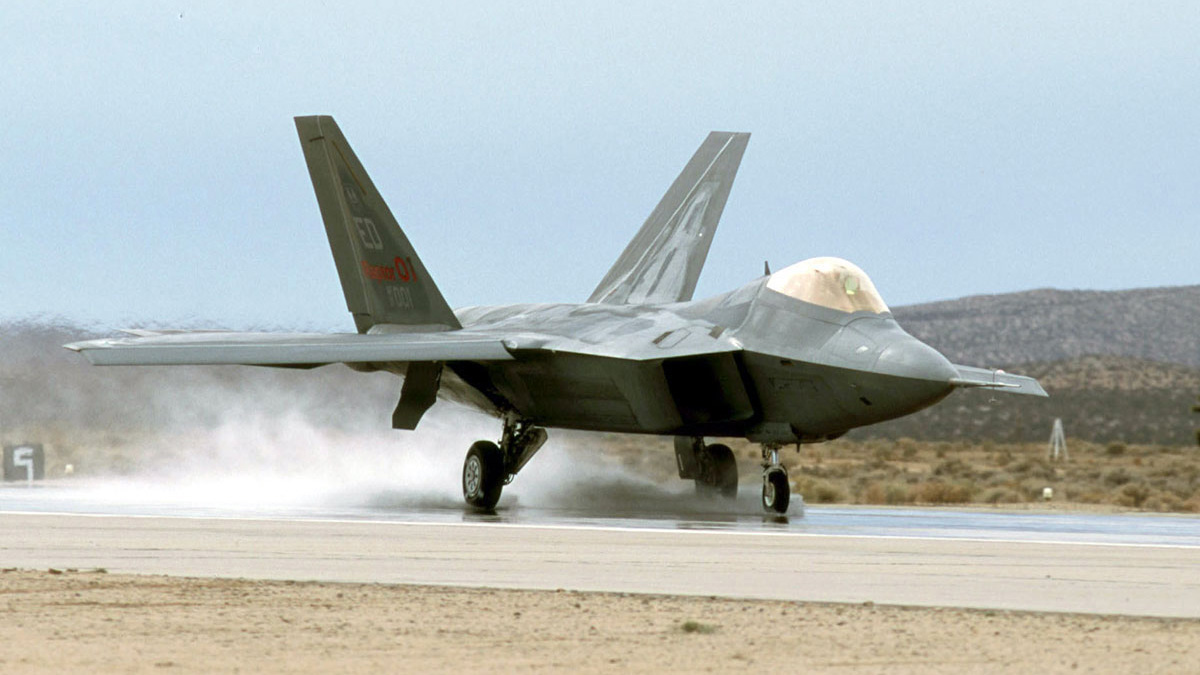 The Lockheed Martin F-22 Raptor (pictured here in prototype testing) has anti-skid brakes to help the pilot maintain control on a wet runway. Your training airplane does not, so use caution. U.S. Air Force photo.