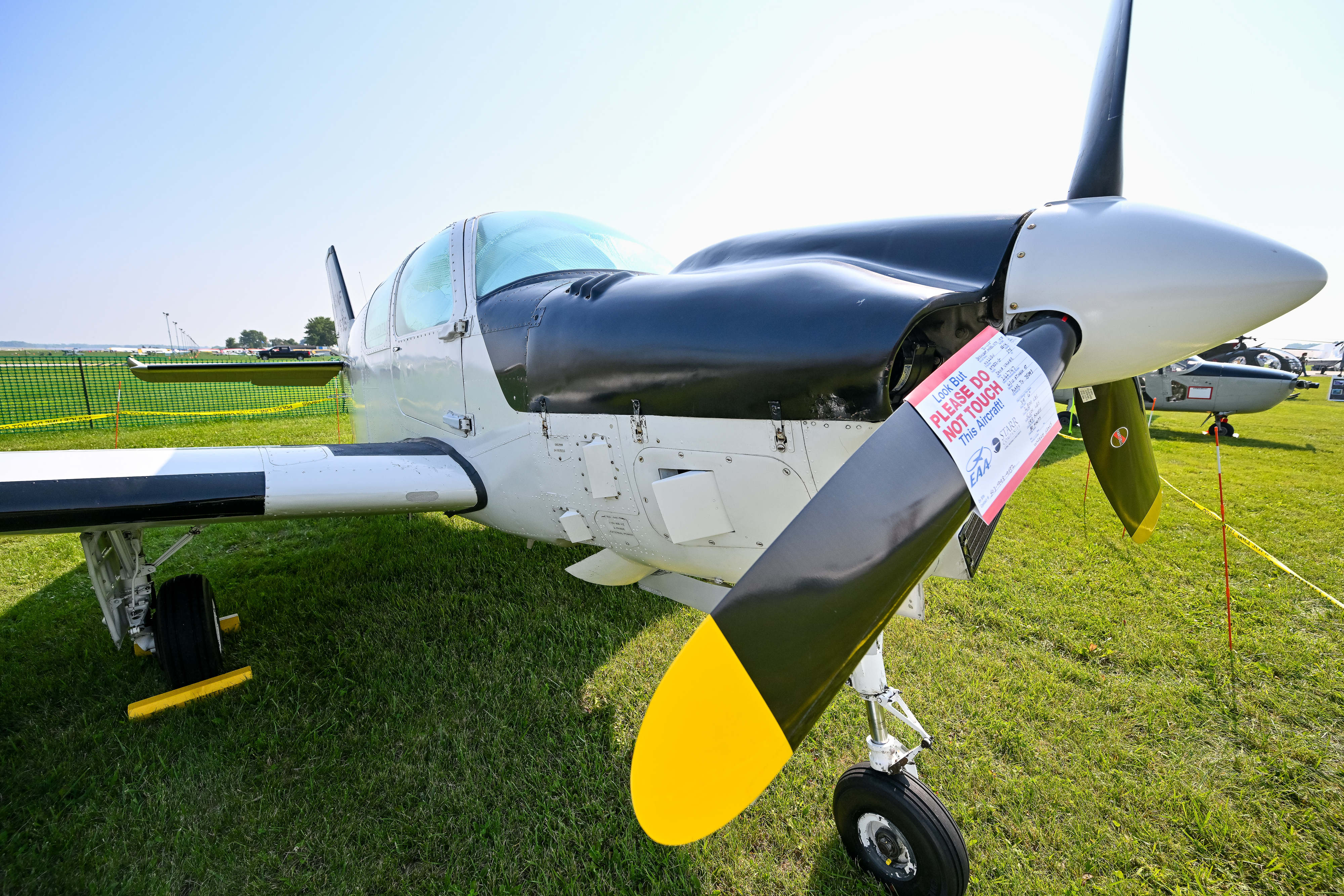 A Beechcraft QU-22B that once flew spy missions was parked among the warbirds during EAA AirVenture Oshkosh in Wisconsin. Photo by David Tulis.