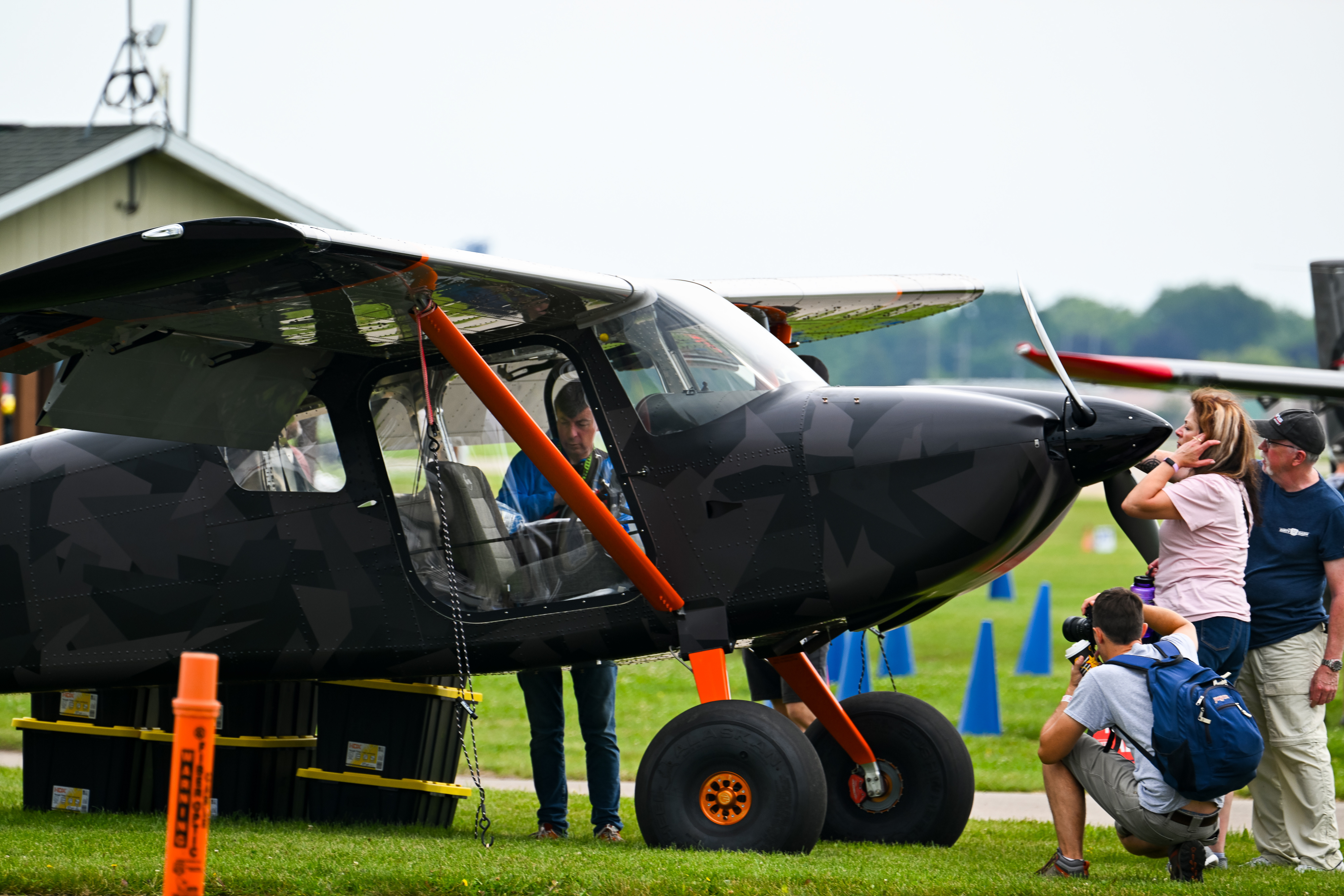 25_AirVenture_Sat1 A Van's Aircraft RV-15 draws attention ahead of the official opening of EAA AirVenture Oshkosh at Wittman Regional Airport in Oshkosh, Wisconsin, on July 19. Photo by David Tulis.