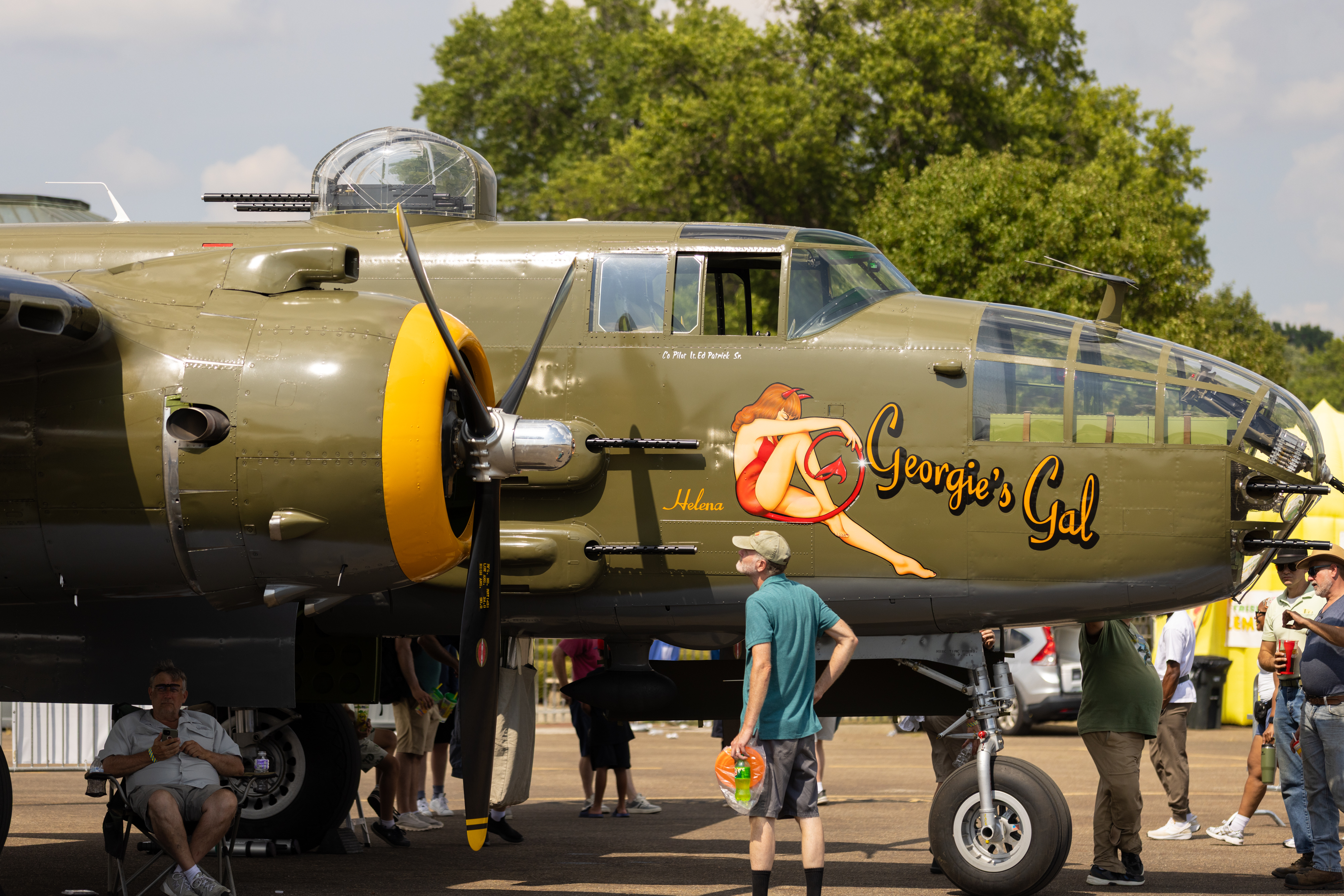 Attendees admire a North American B-25 Mitchell named 'Georgie’s Gal'. Photo by Rebecca Boone.
