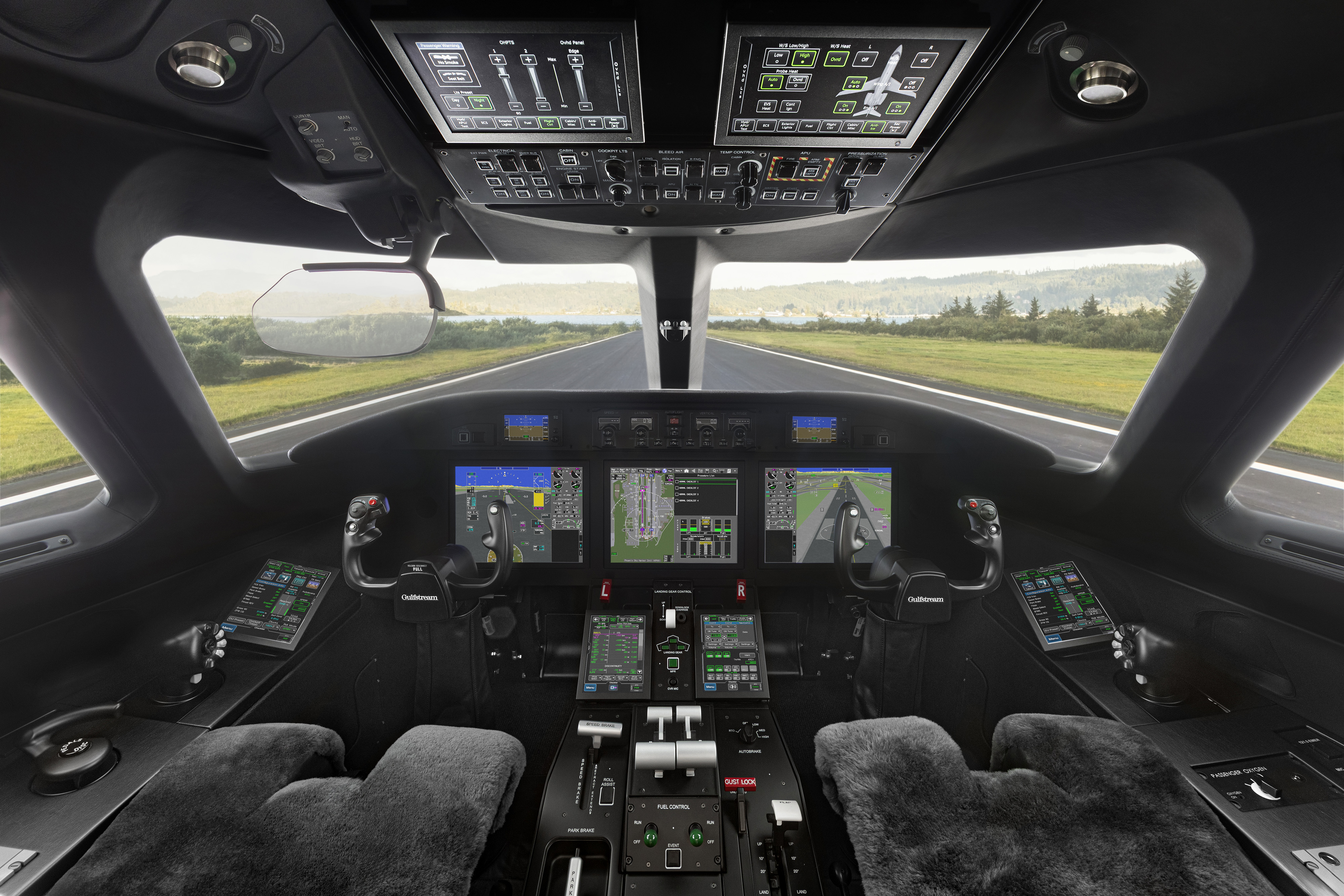 The G300's Harmony Flight Deck includes synthetic vision, head-up displays, Phase-of-Flight intelligence, and Gulfstream’s Predictive Landing Performance System, with six touch screens that are expected to deliver a similar pilot experience for those transitioning from the large-cabin Gulfstreams. Photo courtesy of Gulfstream Aerospace Corp. The G300's Harmony Flight Deck includes synthetic vision, head-up displays, Phase-of-Flight intelligence, and Gulfstream’s Predictive Landing Performance System, with six touch screens that are expected to deliver a similar pilot experience for those transitioning from the large-cabin Gulfstreams. Photo courtesy of Gulfstream Aerospace Corp.