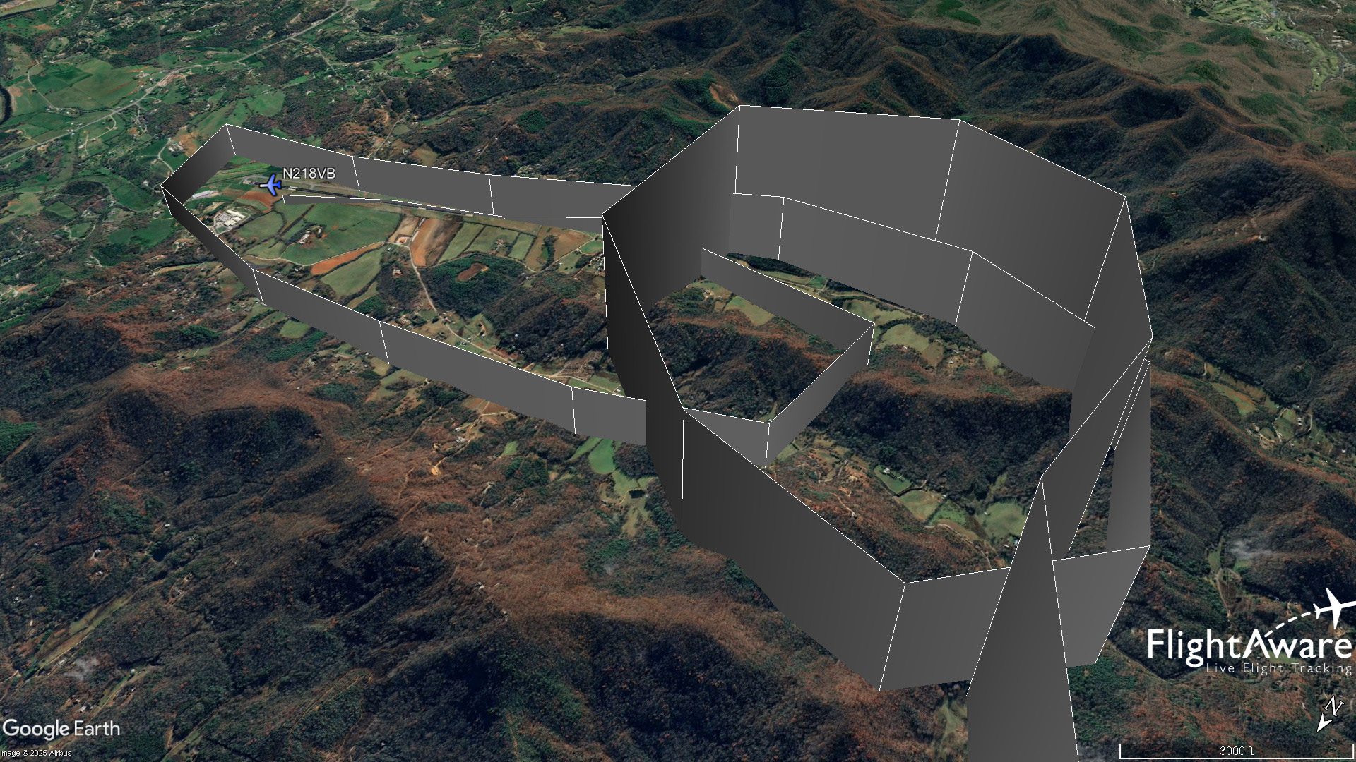 ADS-B data recorded by FlightAware shows the flight path of the Cirrus SR22T approaching Macon County Airport in North Carolina, making one circuit in the pattern, and then crashing during an apparent go-around attempt. Google Earth image.