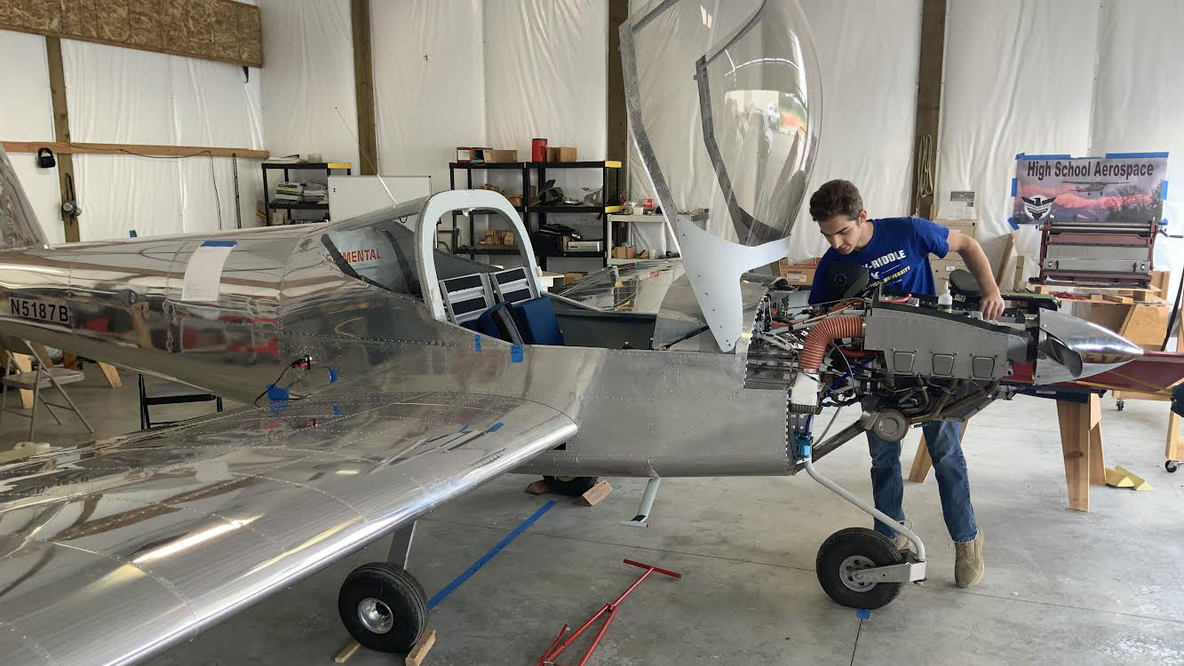 Student Kody Boksch is working on a Van’s Aircraft RV-12. Photo courtesy of the North Idaho High School Aerospace Program.