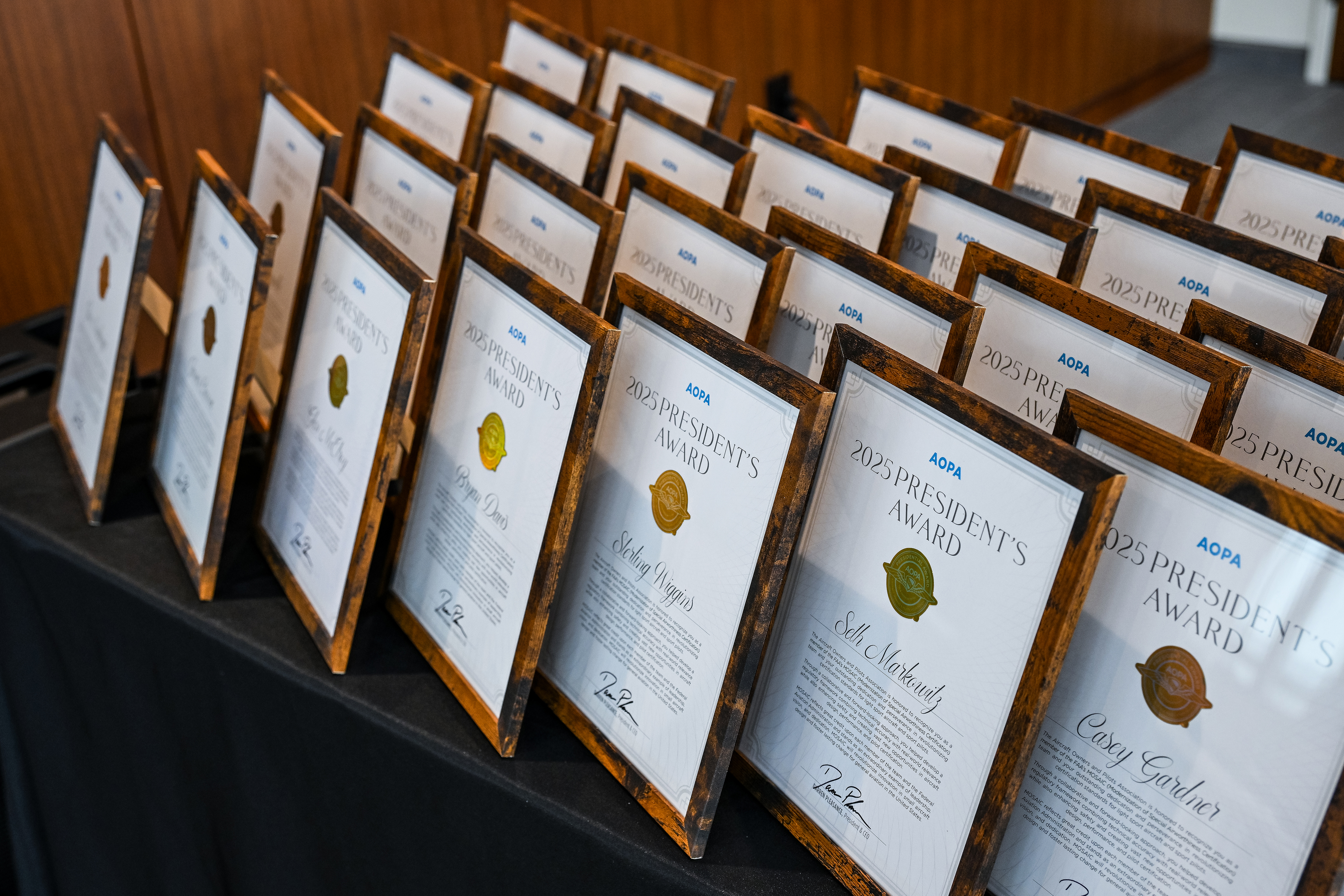 AOPA President's Award citations are grouped ahead of the presentation. Photo by David Tulis.