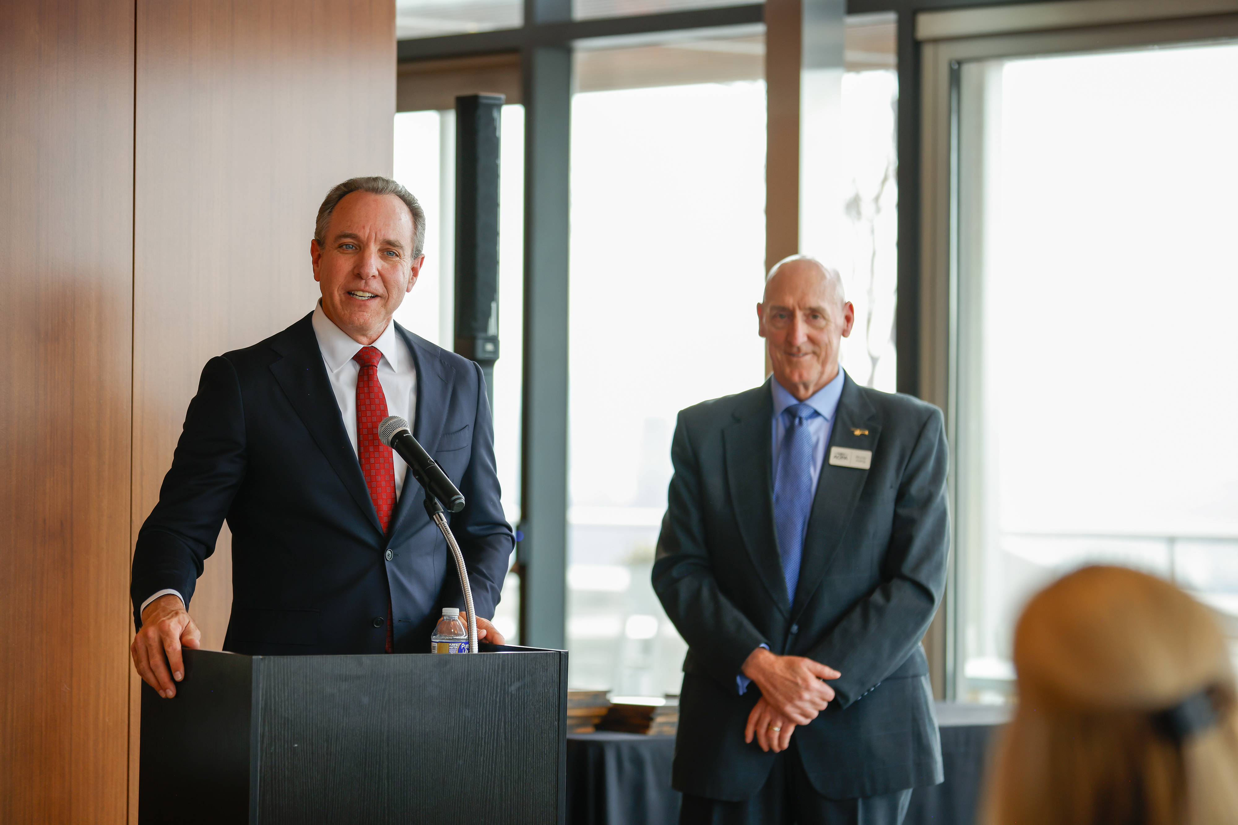 AOPA President Darren Pleasance, left, and AOPA Vice President of Government Affairs Murray Huling greet attendees. Photo by Rebecca Boone.