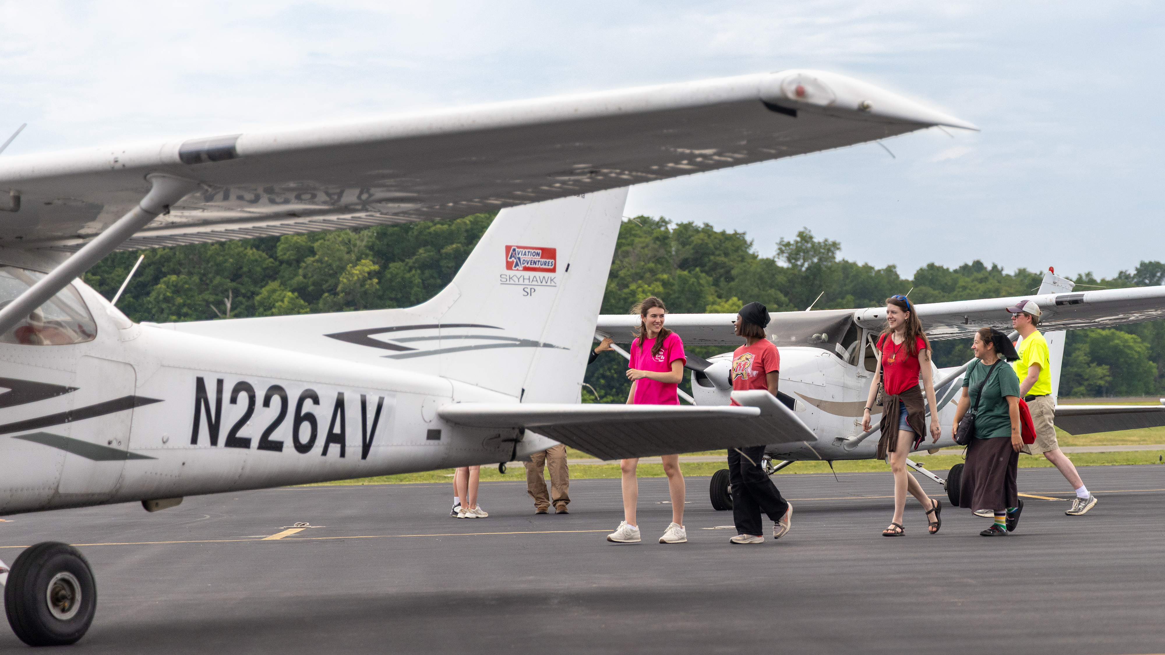 The Women Can Fly event at Warrenton/Fauquier Airport in Virgina on June 6 gave women and children of all ages the opportunity to fly in general aviation aircraft, learn about careers in aviation, and experience the joy of flight. Photo by Rebecca Boone.