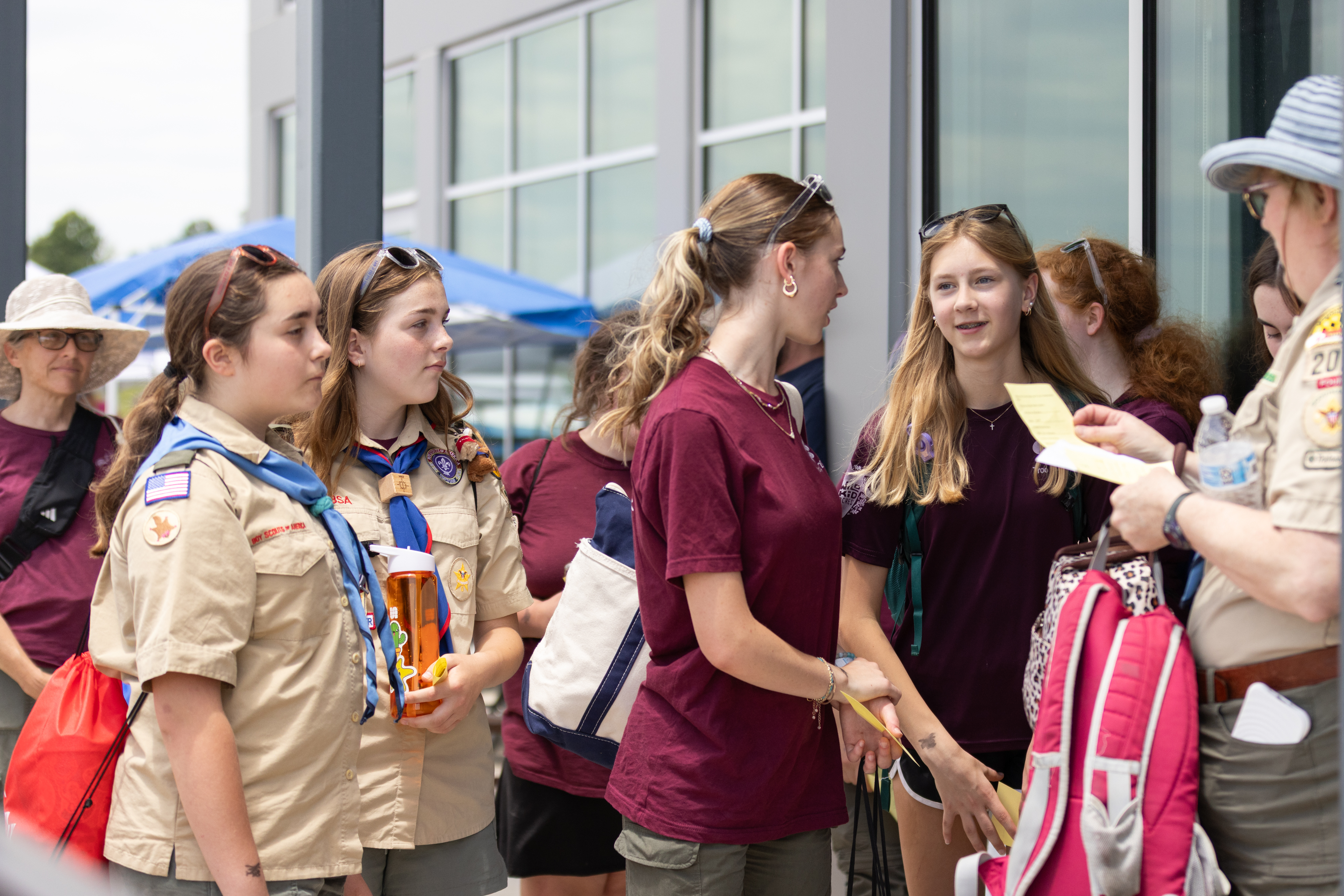 Attendees laugh as they wait in line for their first flight. Photo by Rebecca Boone.