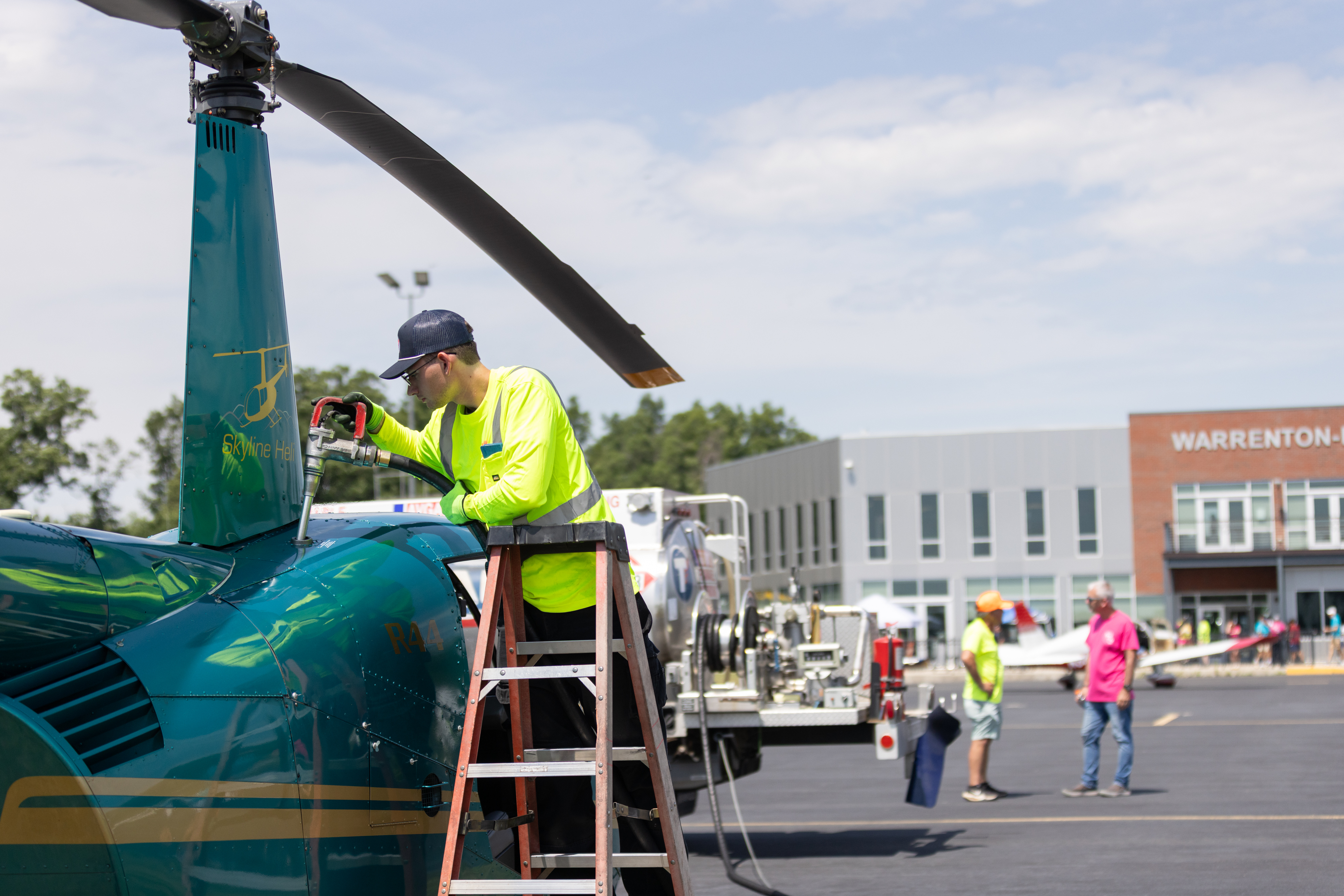 The Robinson R44 helicopter is refueled in between flights. Photo by Rebecca Boone.