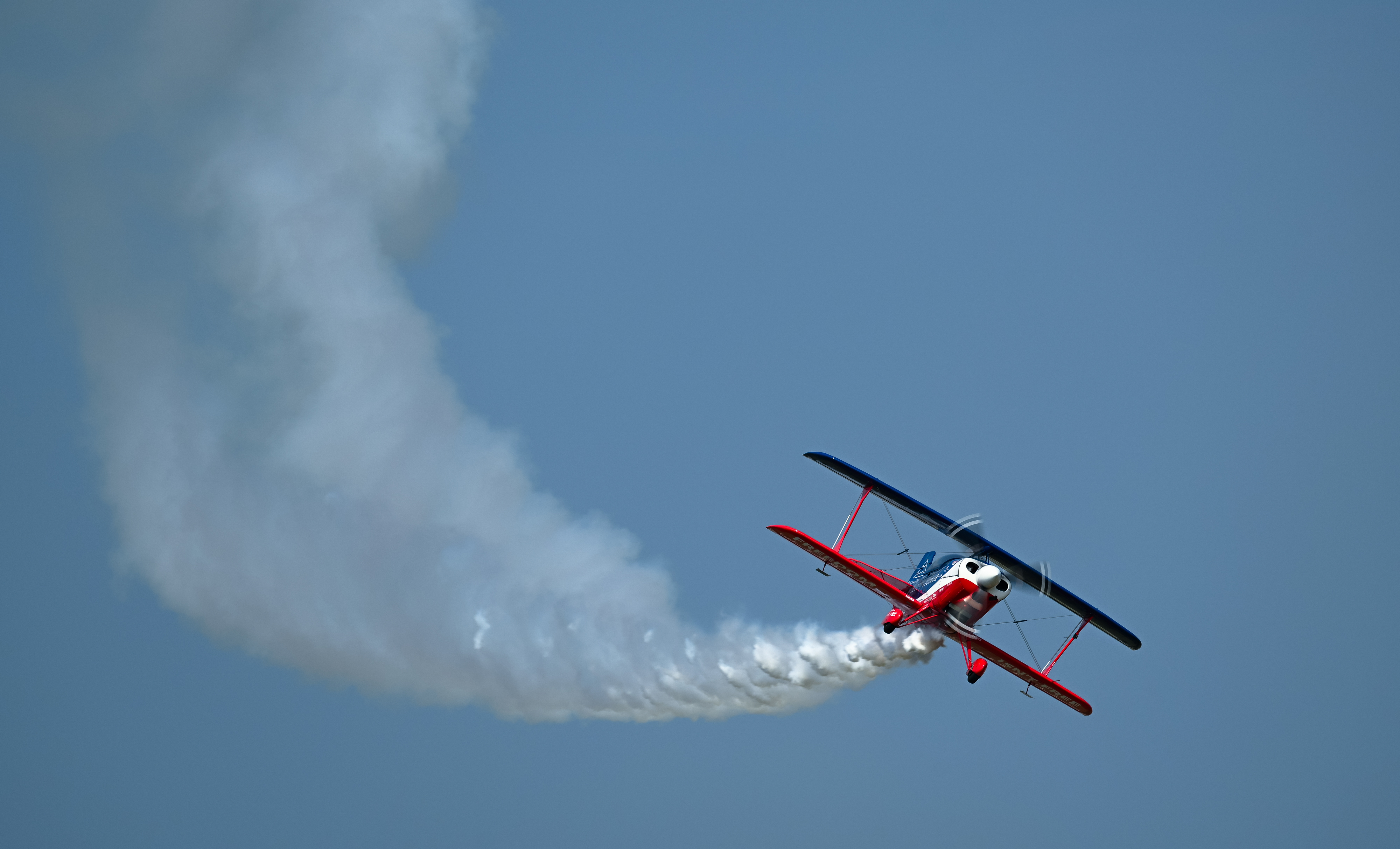 Pilot Ed Hamill performs during the opening day airshow. Photo by David Tulis.