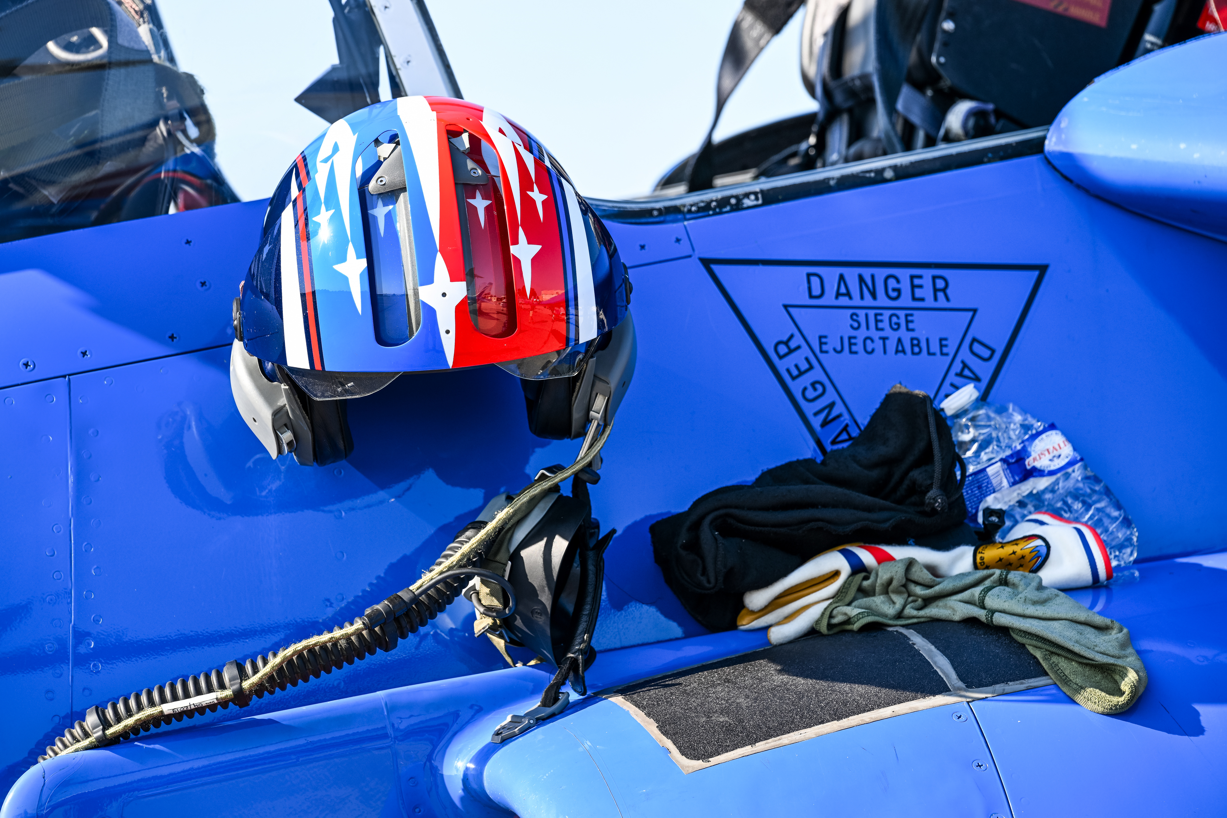 The helmet of a Patrouille de France pilot rests on his Dassault/Dornier Alpha Jet. Photo by David Tulis.