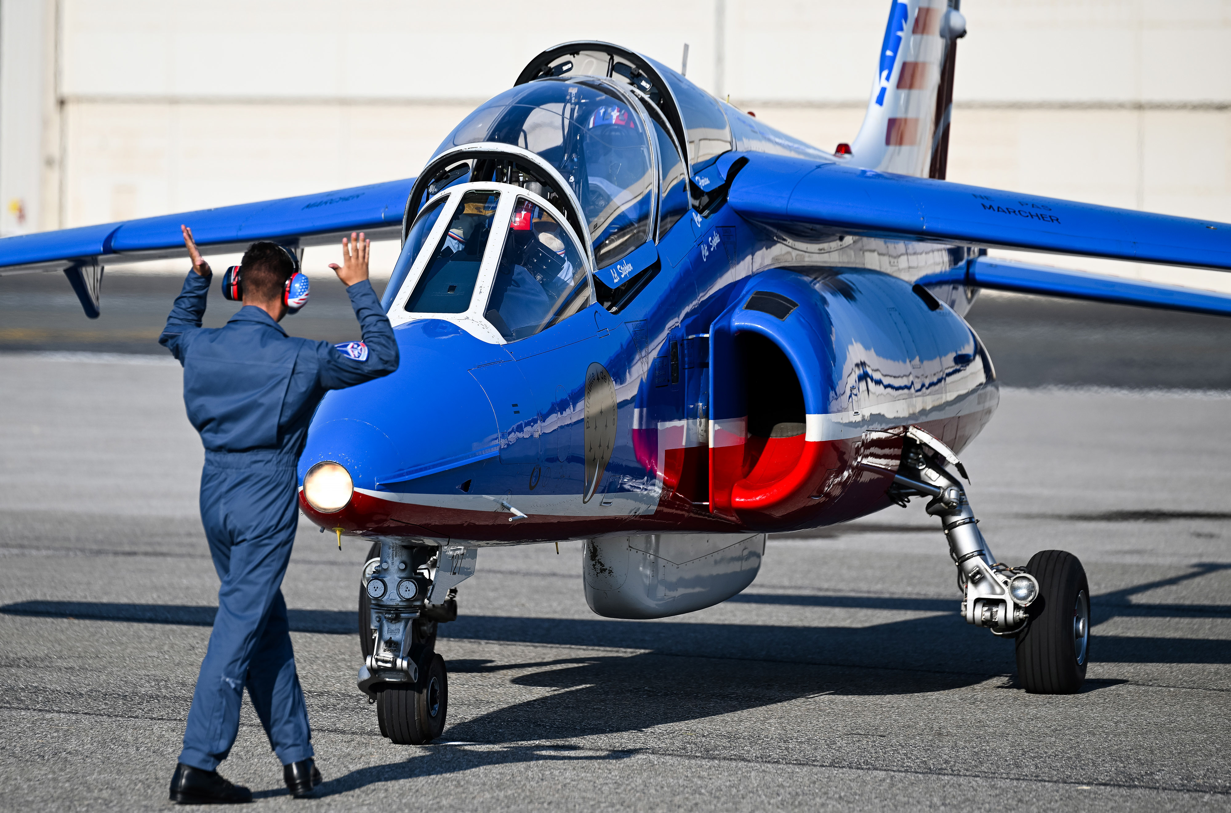 A Patrouille de France team member shuts down a Dassault/Dornier Alpha Jet after a formation flying practice. Photo by David Tulis.