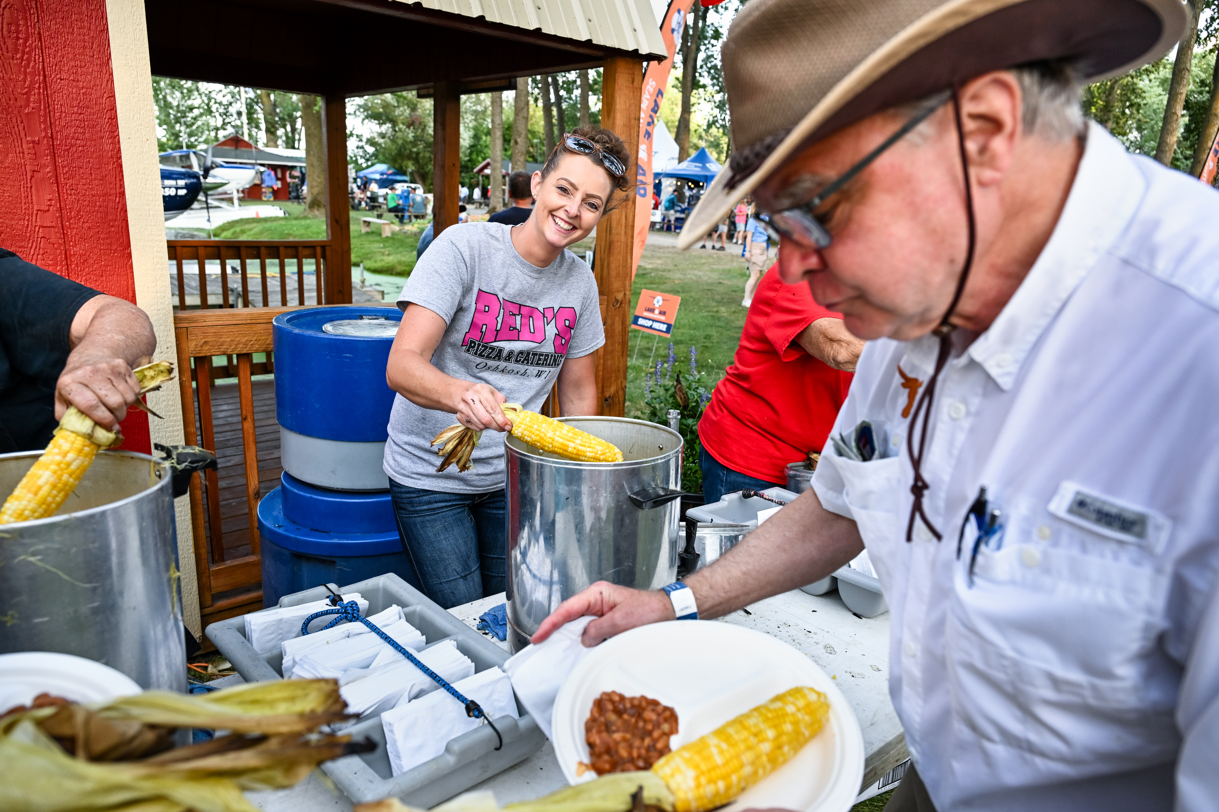 Pilots attend the Seaplane Pilots Association’s annual corn roast at the seaplane base. Photo by David Tulis.