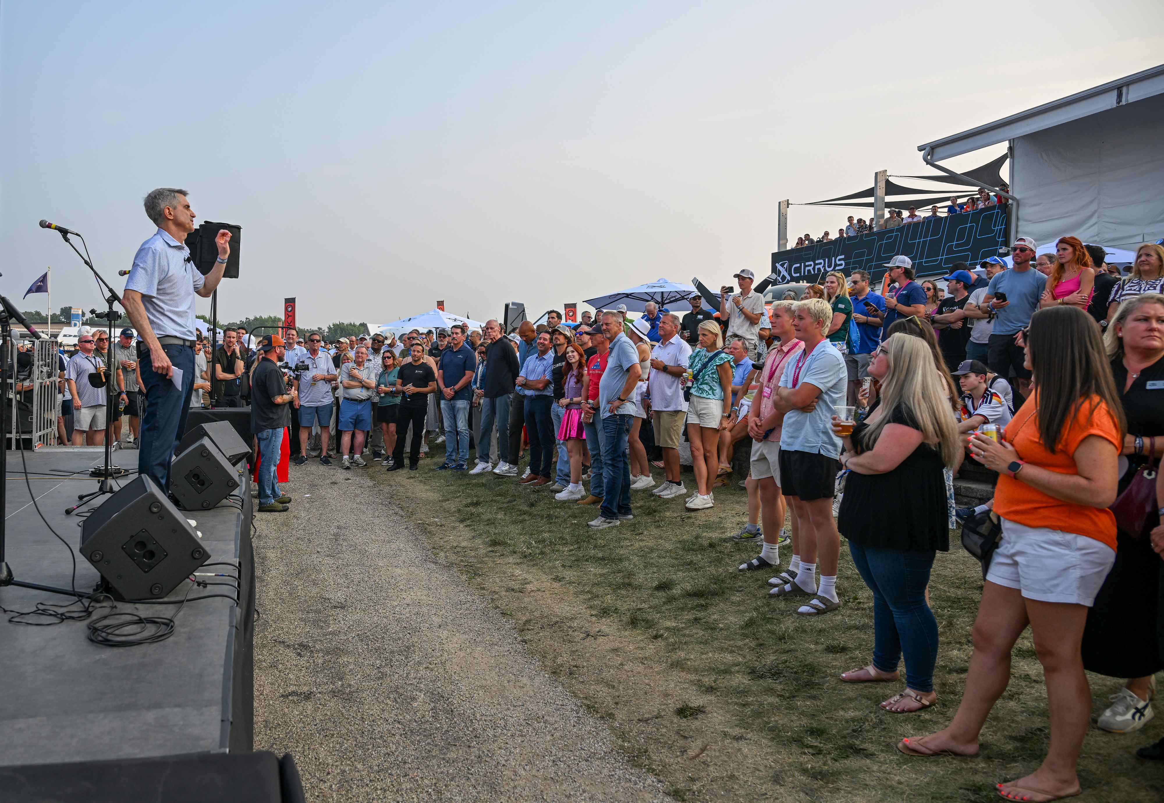 Attendees participate in the Cirrus Aircraft welcome party. Photo by David Tulis.