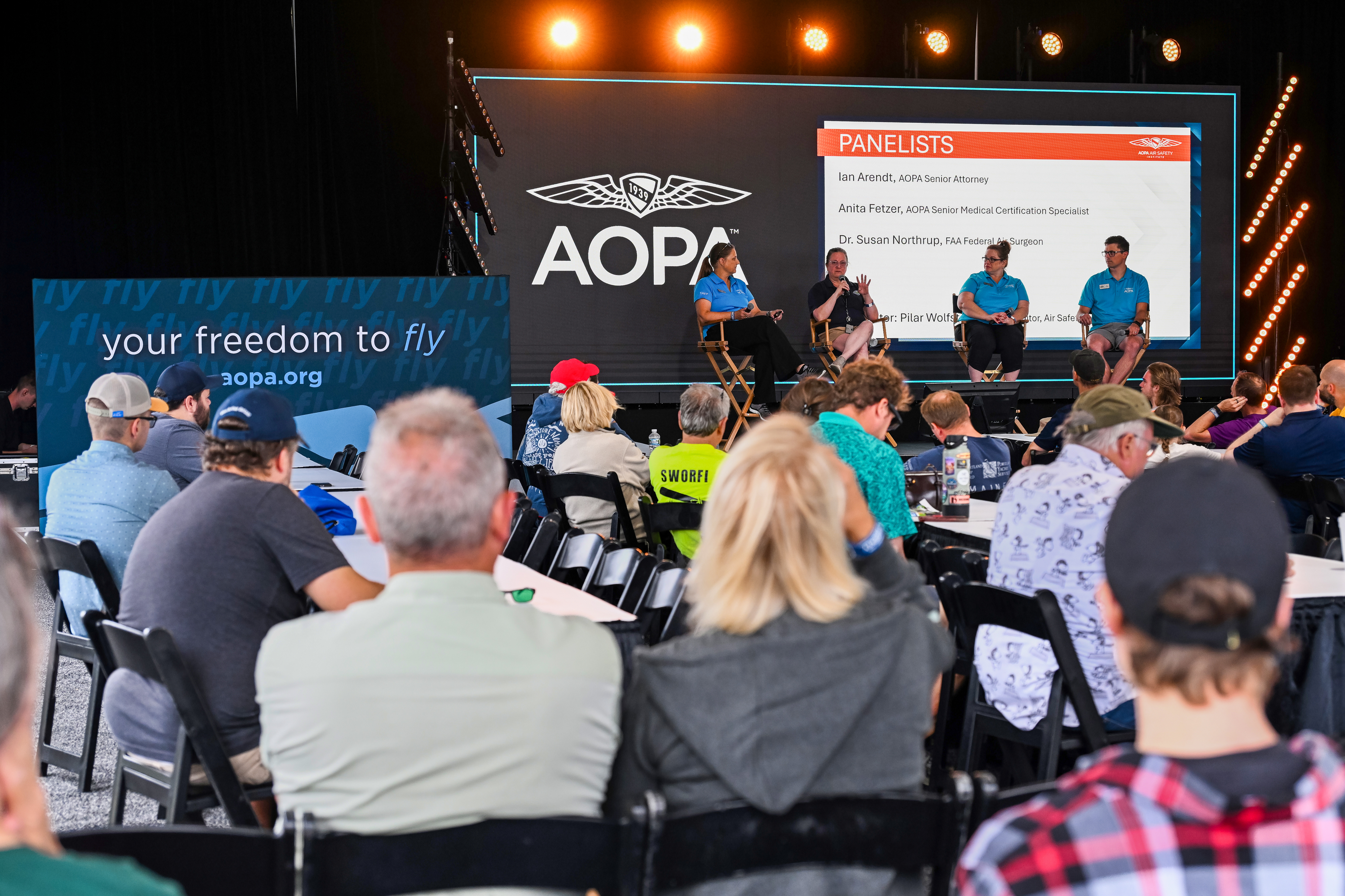 AOPA Air Safety Institute Senior Editor Pilar Wolfsteller, FAA Federal Air Surgeon Dr. Susan Northrup, AOPA Senior Medical Certification Specialist Anita Fetzer, and AOPA Senior Attorney Ian Arendt participate in a panel discussion during a medical seminar. Photo by David Tulis.