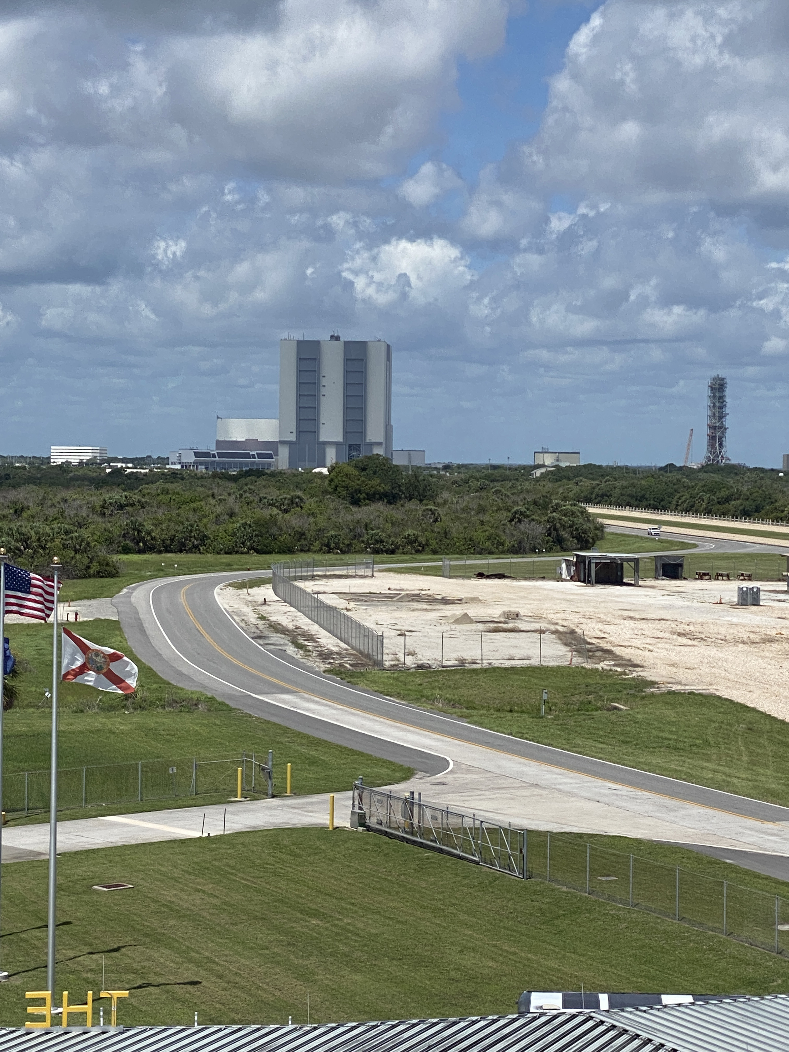 Two of the vehicle assembly building’s four high bay doors that open 456 feet high are visible from the Gantry at LC-39. Crawler transporters carry space launch systems from the VAB to launch pads at one mile per hour. Photo by Alyssa J. Cobb.